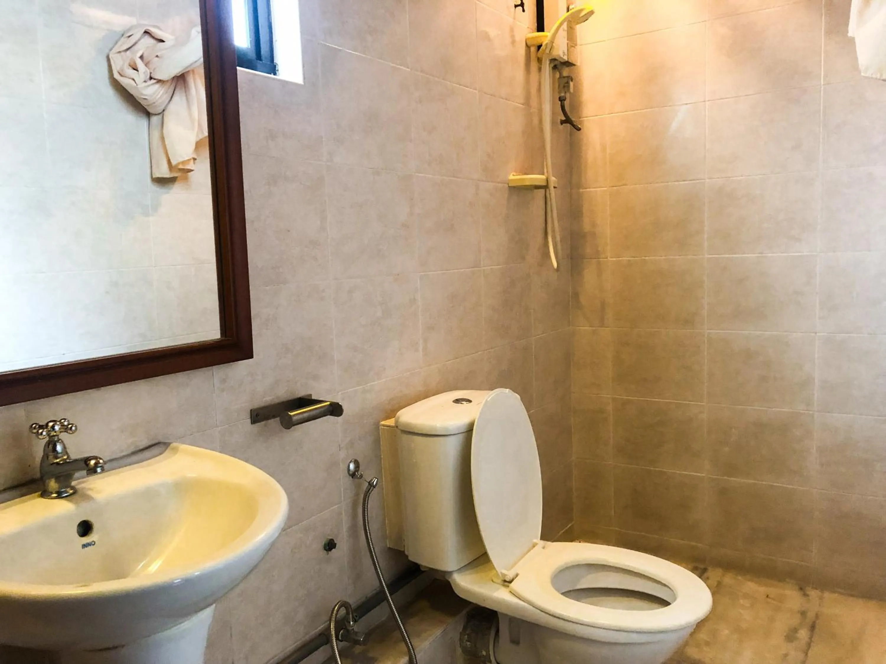 Bathroom in Hotel O I.villa Inn