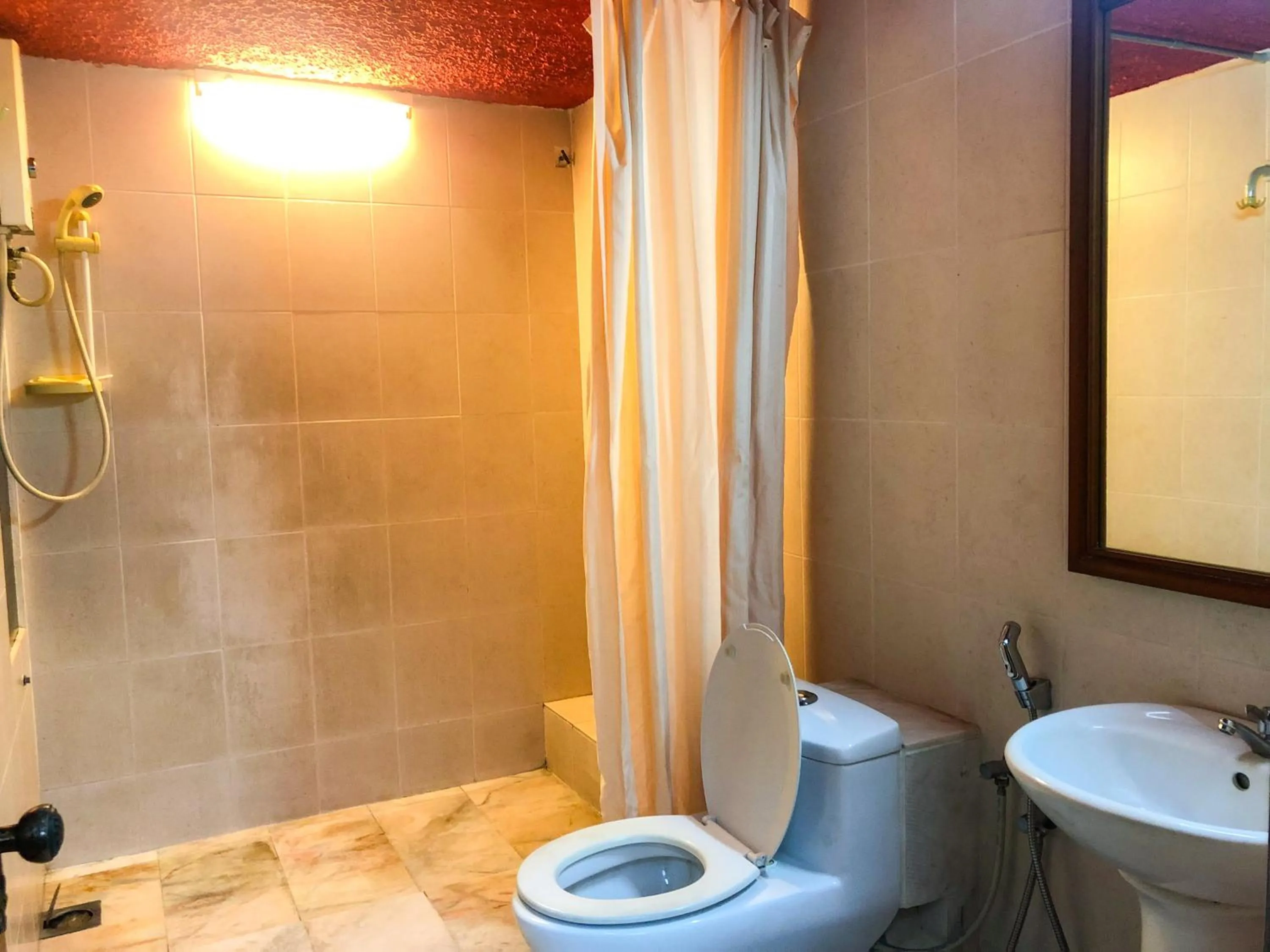 Bathroom in Hotel O I.villa Inn