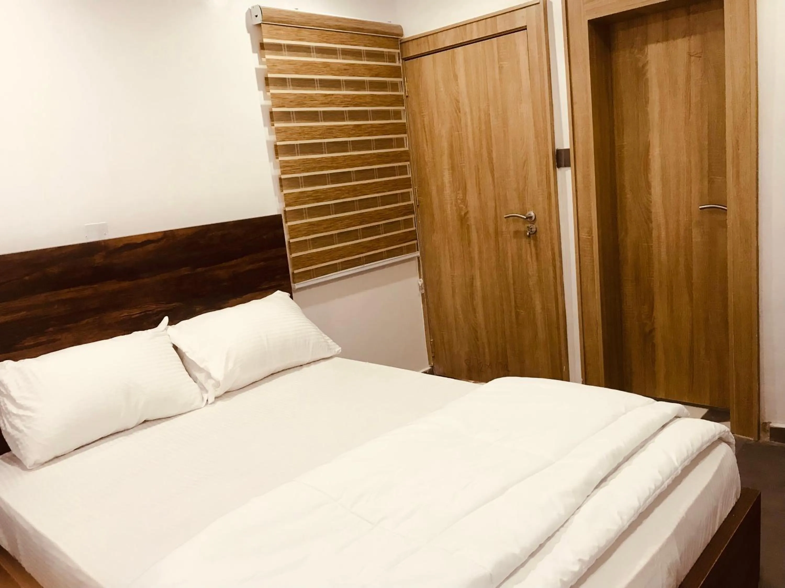 Bed in Skenyo Hotel & Apartments