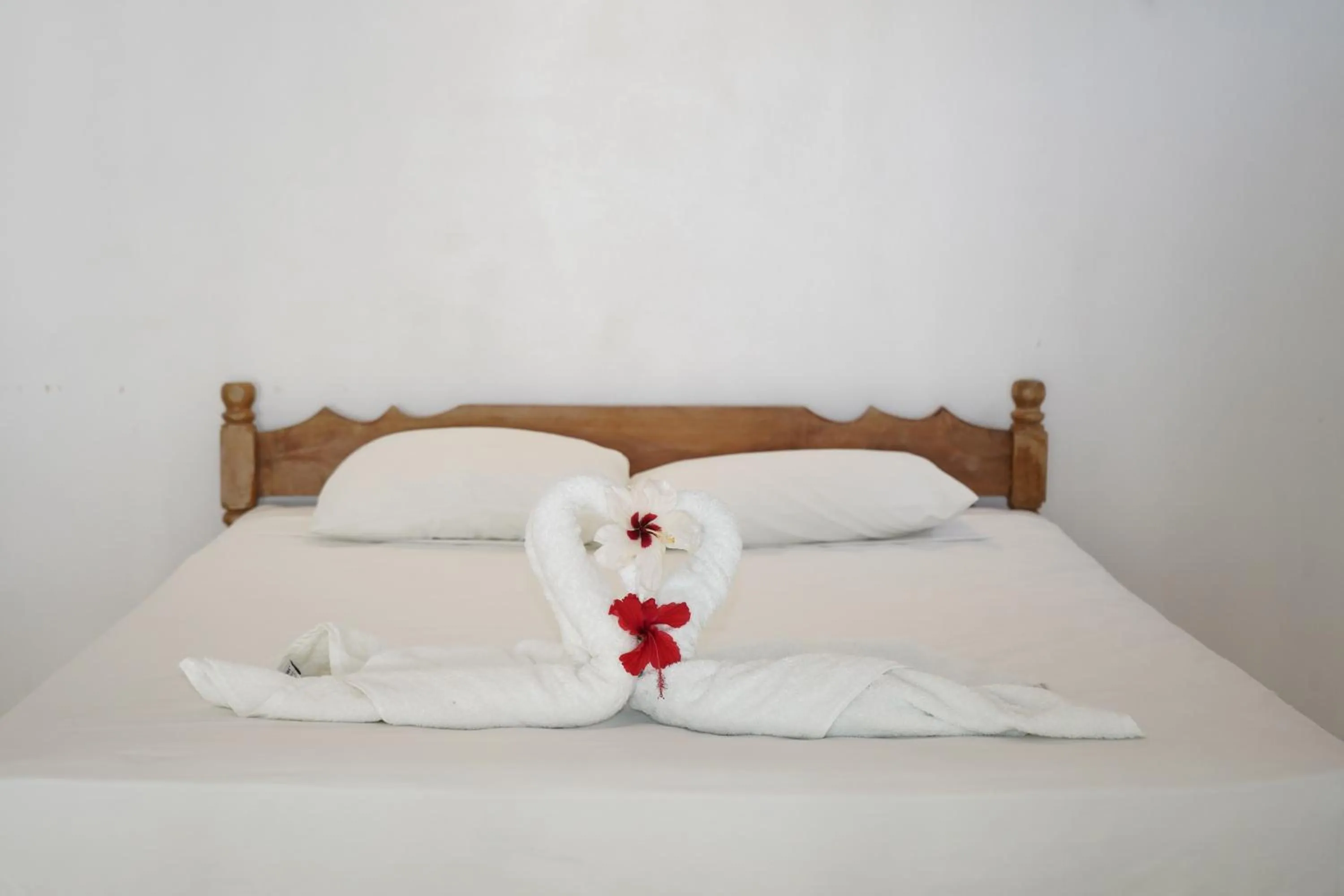 Bed in El Pacifico Hotel