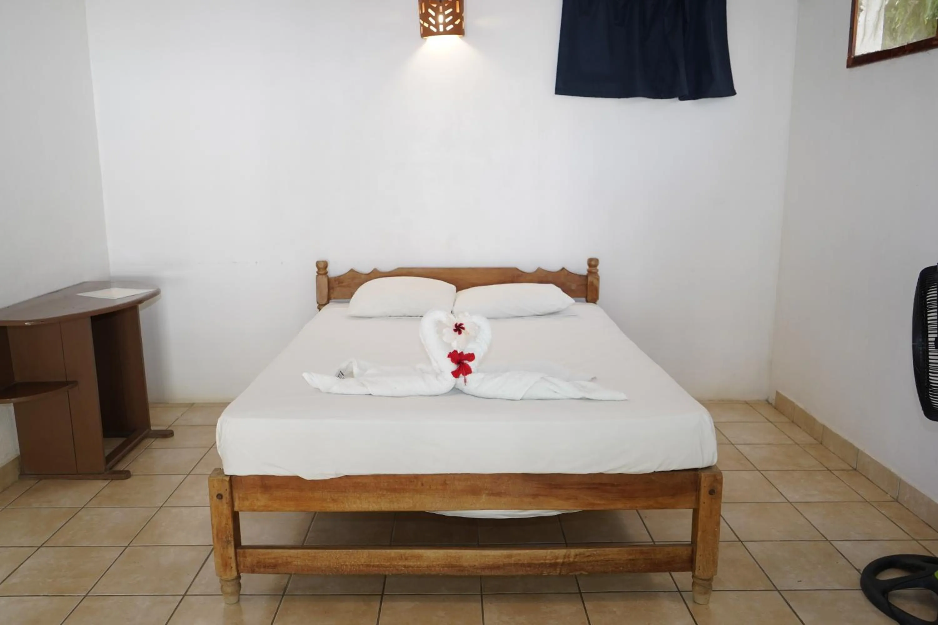 Bed in El Pacifico Hotel