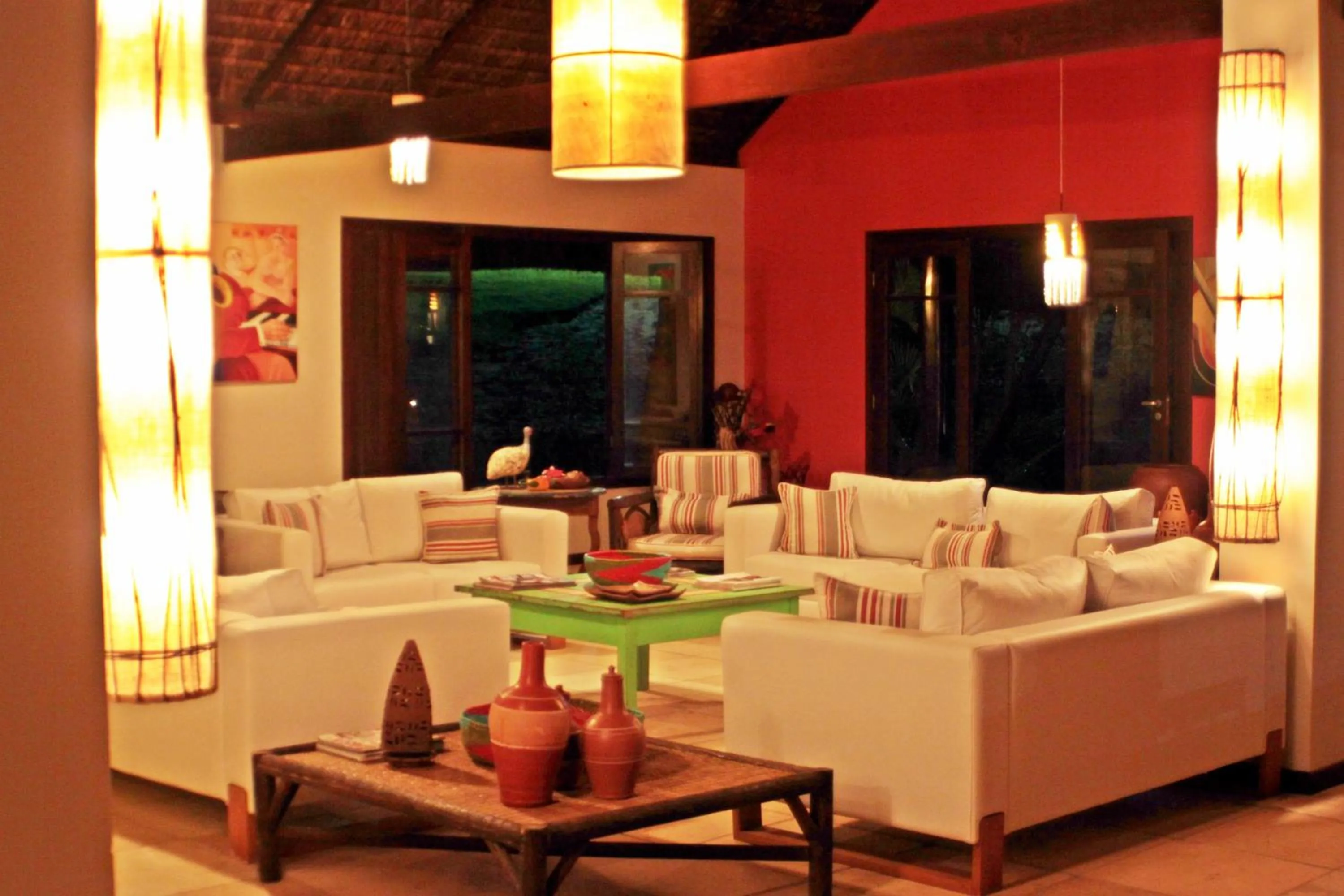 Communal lounge/ TV room in Siri Paraiso Hotel