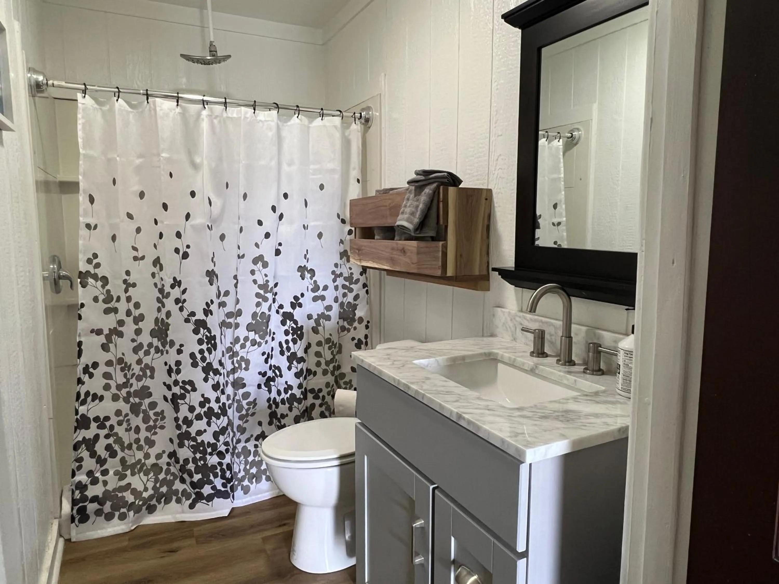 Toilet in Kozy Haven Log Cabin Rentals