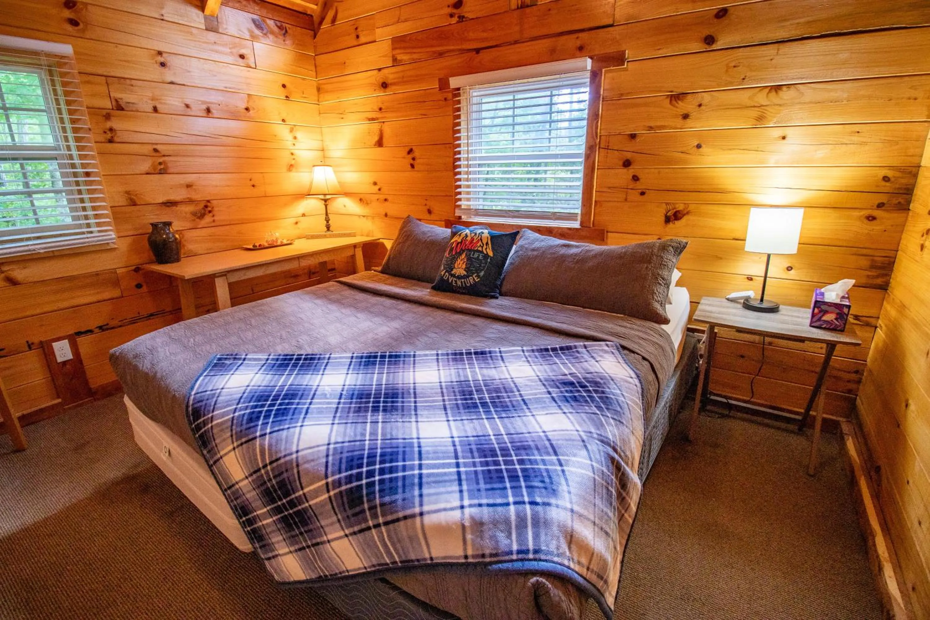 Bed in Kozy Haven Log Cabin Rentals