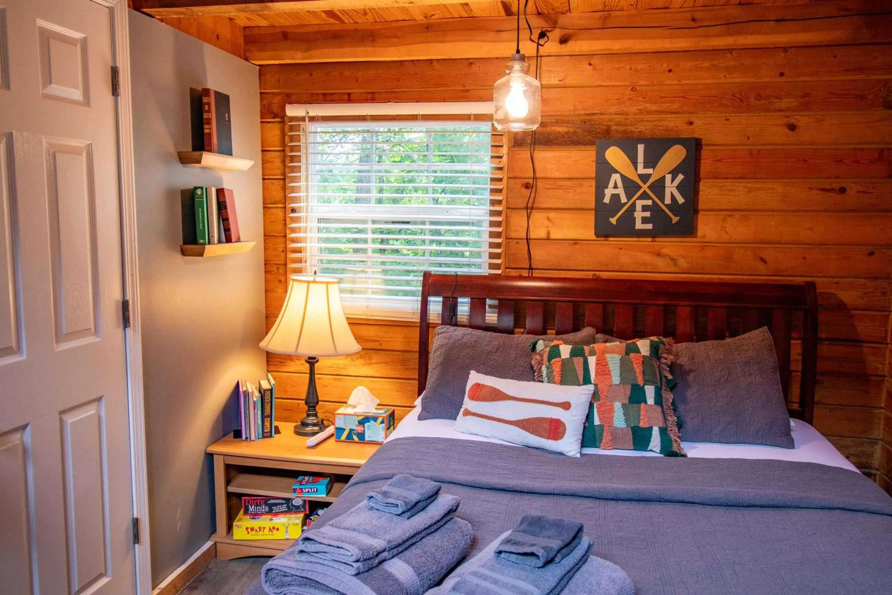 Bed in Kozy Haven Log Cabin Rentals