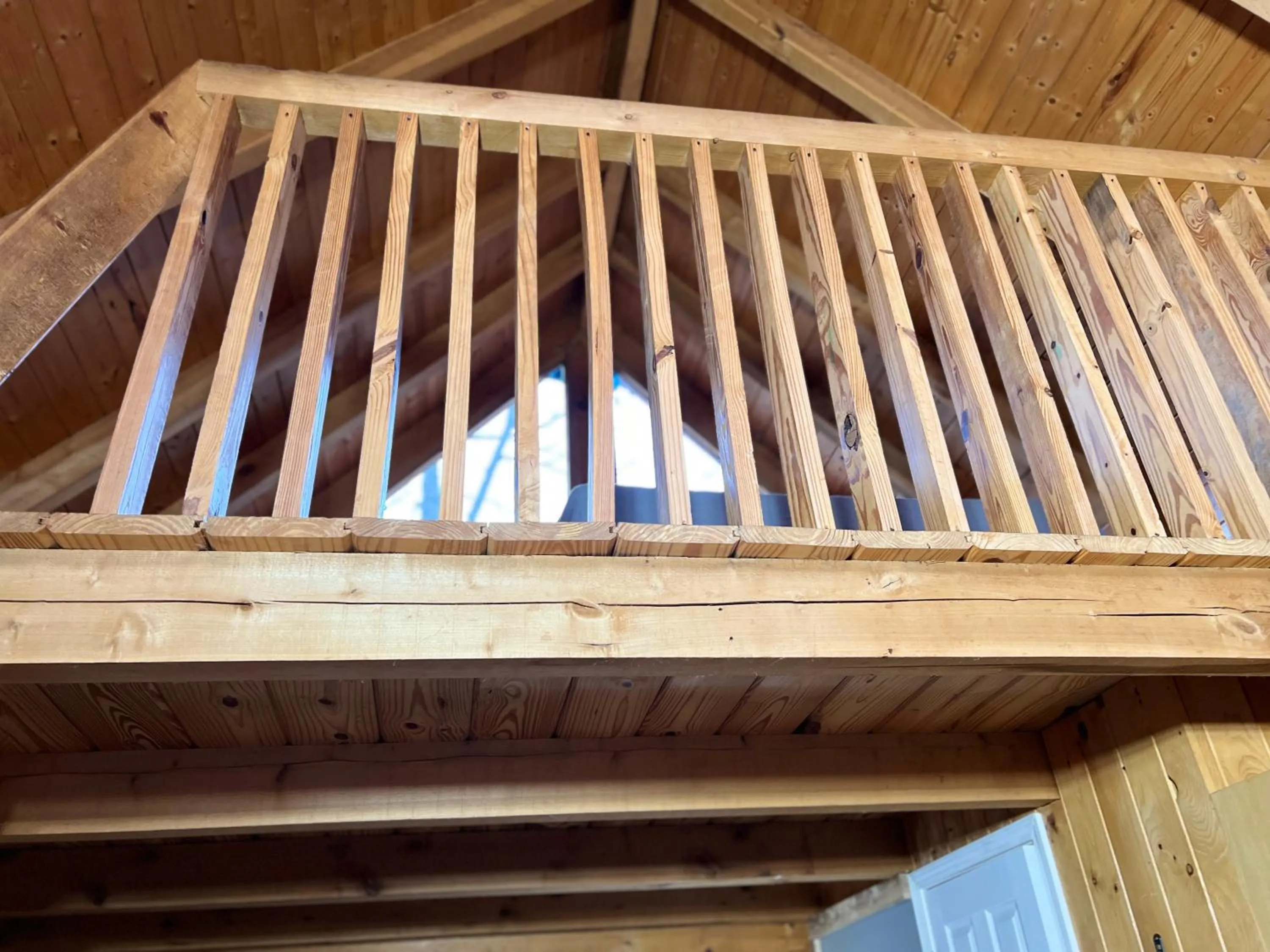 Bed in Kozy Haven Log Cabin Rentals