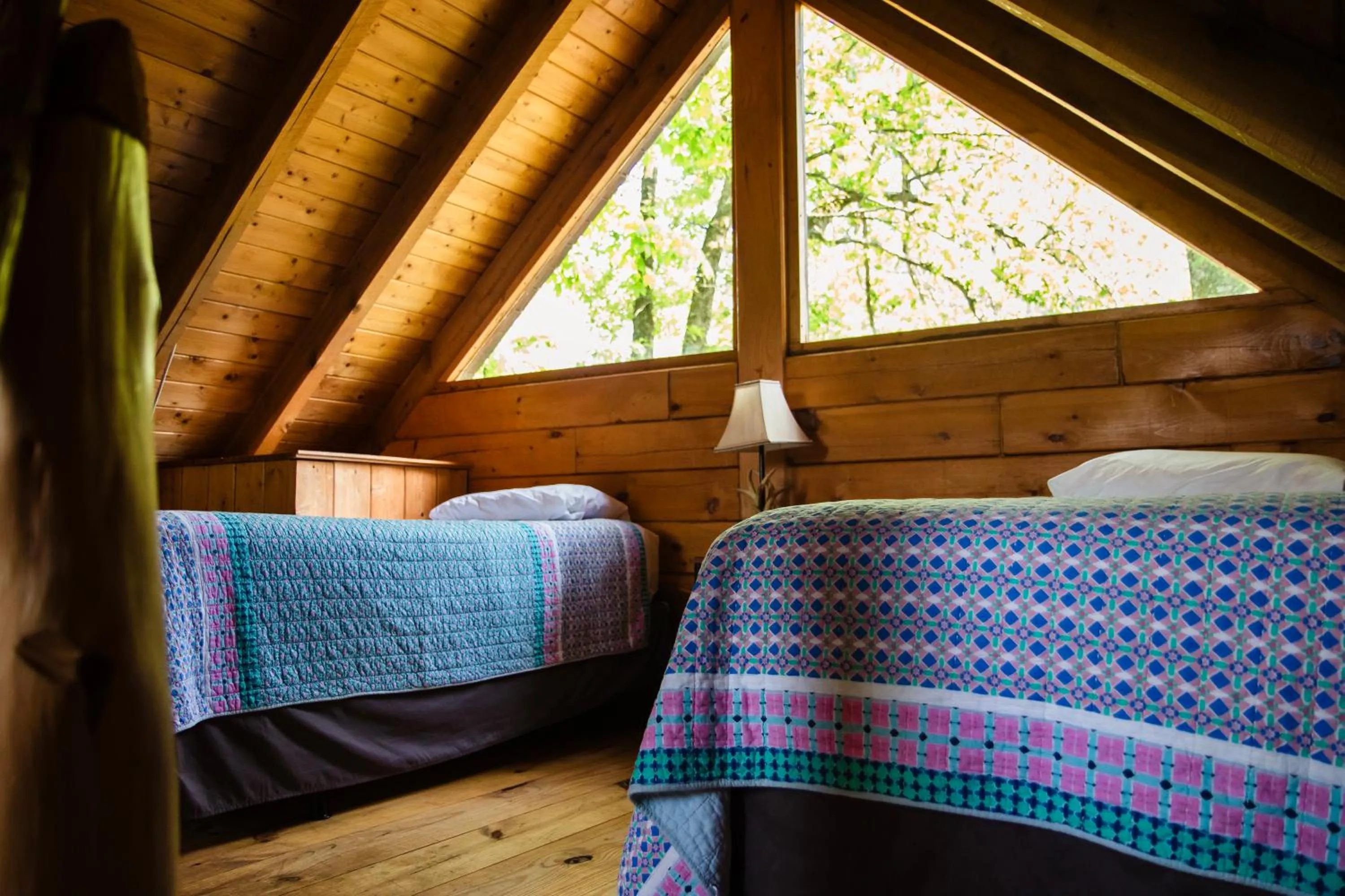Bed in Kozy Haven Log Cabin Rentals