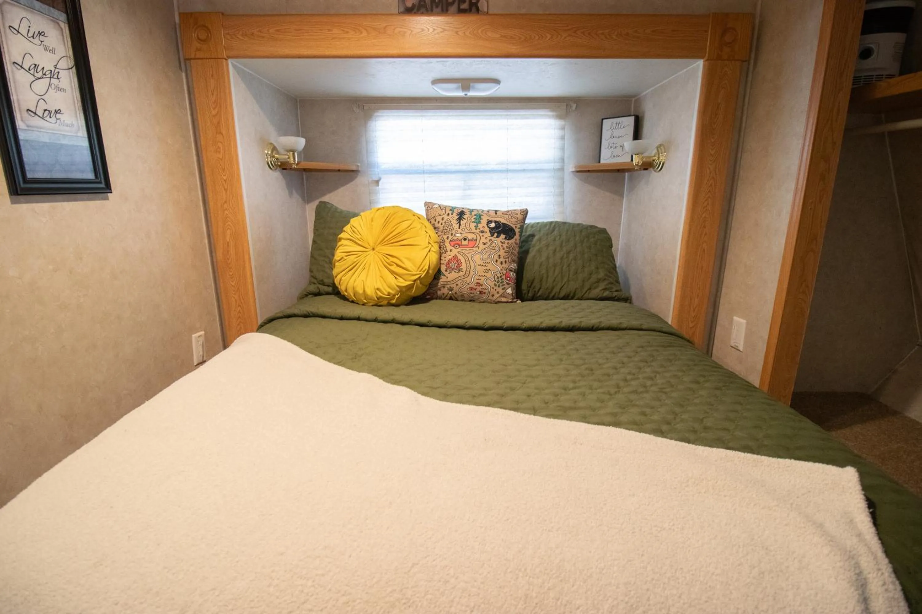 Bed in Kozy Haven Log Cabin Rentals
