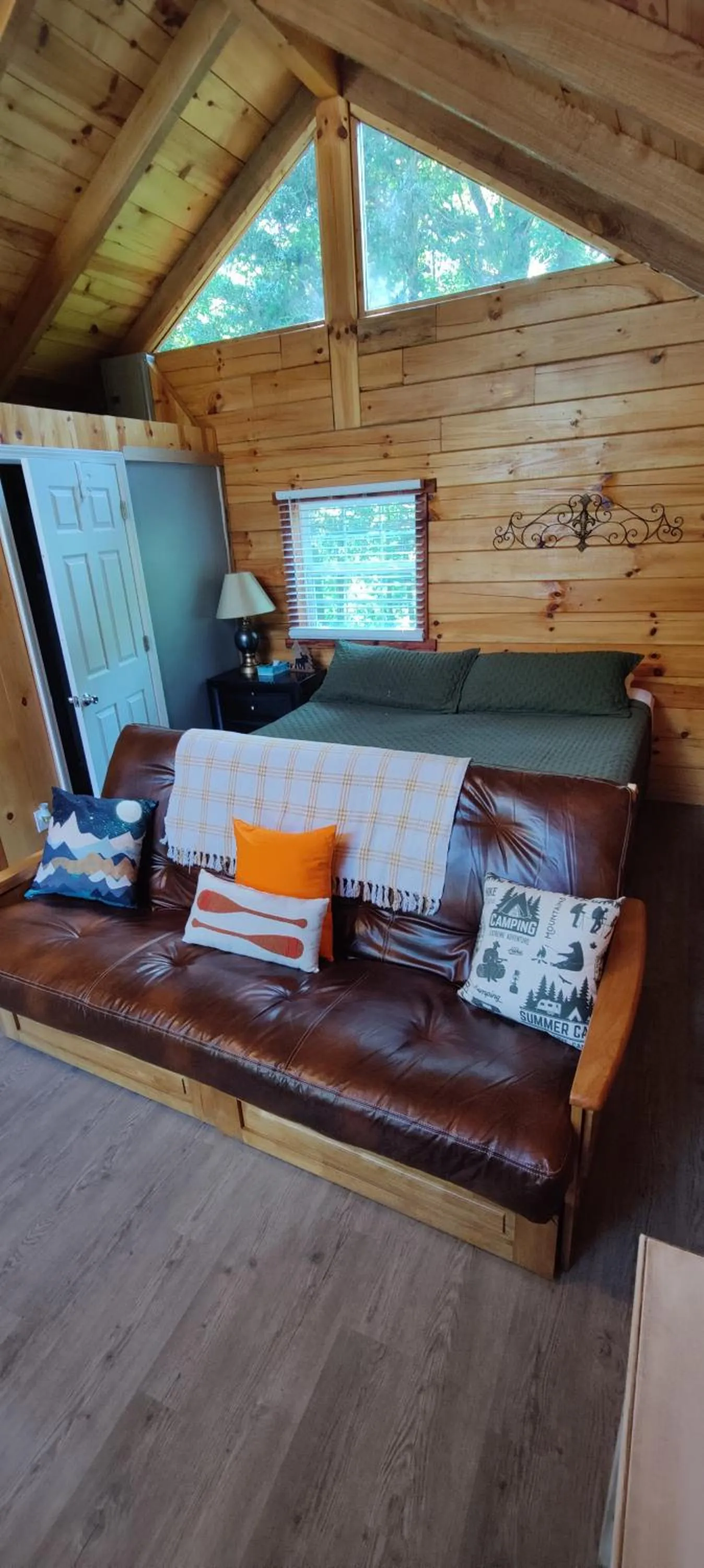 Bed in Kozy Haven Log Cabin Rentals