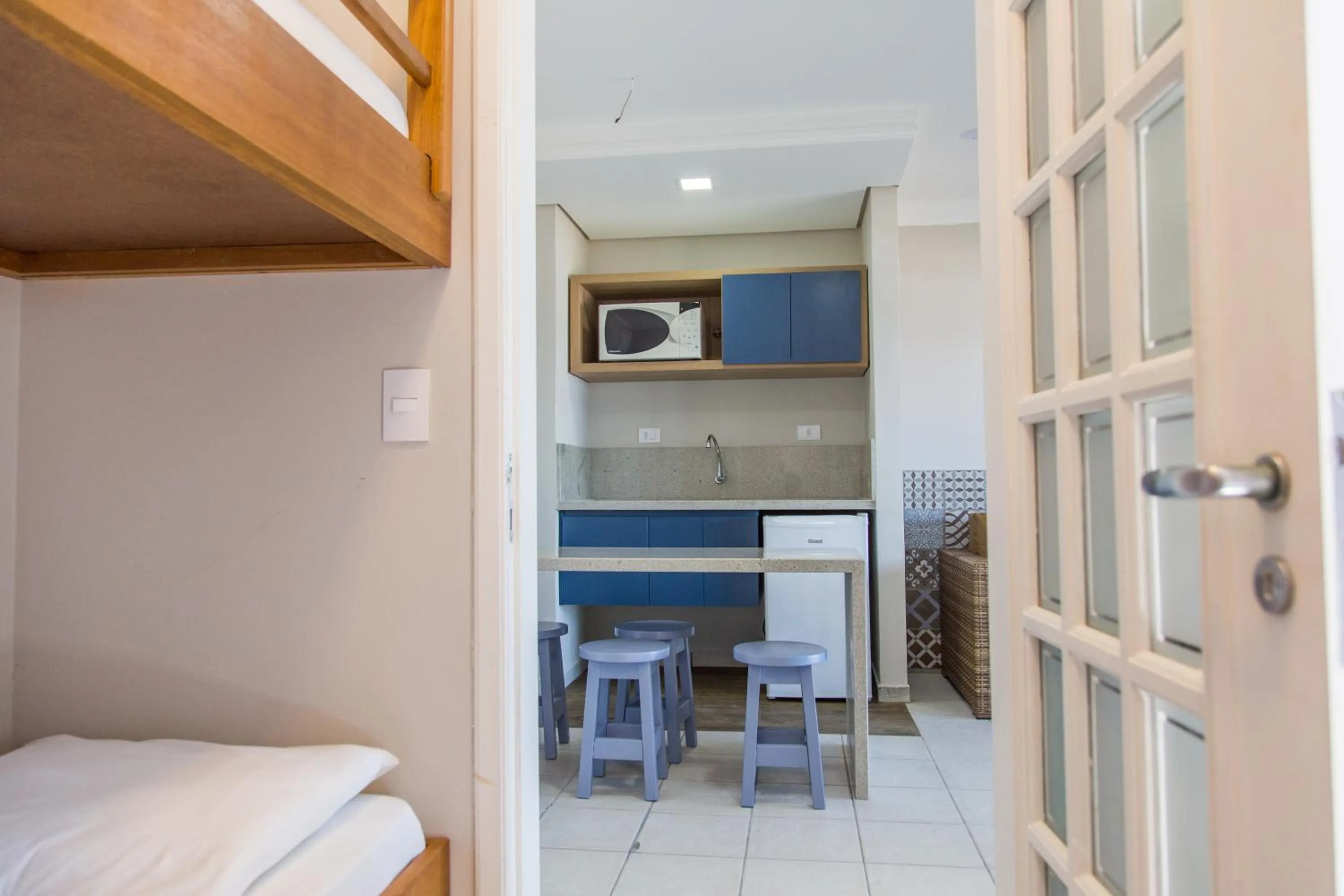 Kitchen or kitchenette, Bed in Spazio Marine Hotel - Guaratuba