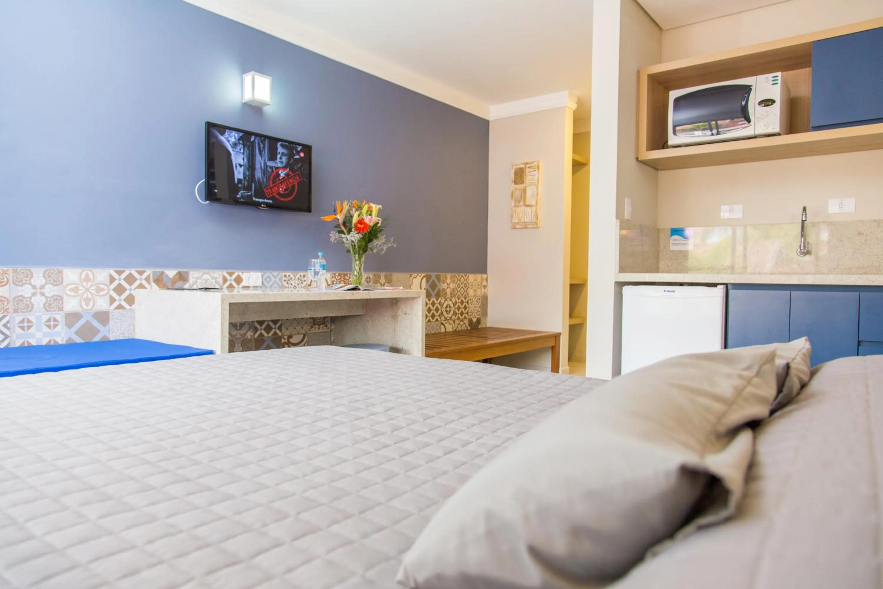 Kitchen or kitchenette, Bed in Spazio Marine Hotel - Guaratuba