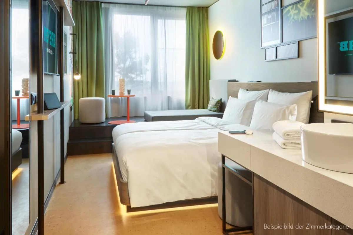 Photo of the whole room, Bed in REVERB by Hard Rock Hamburg