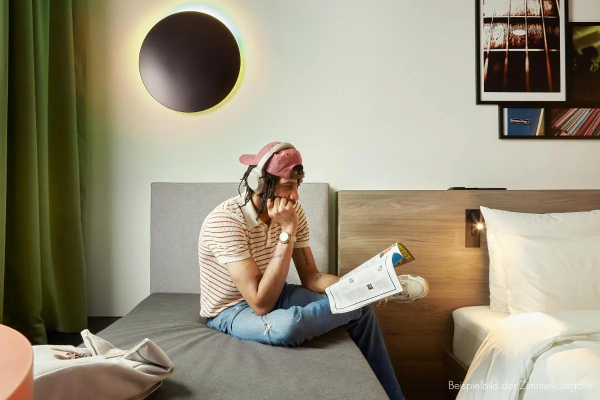 Photo of the whole room, Bed in REVERB by Hard Rock Hamburg