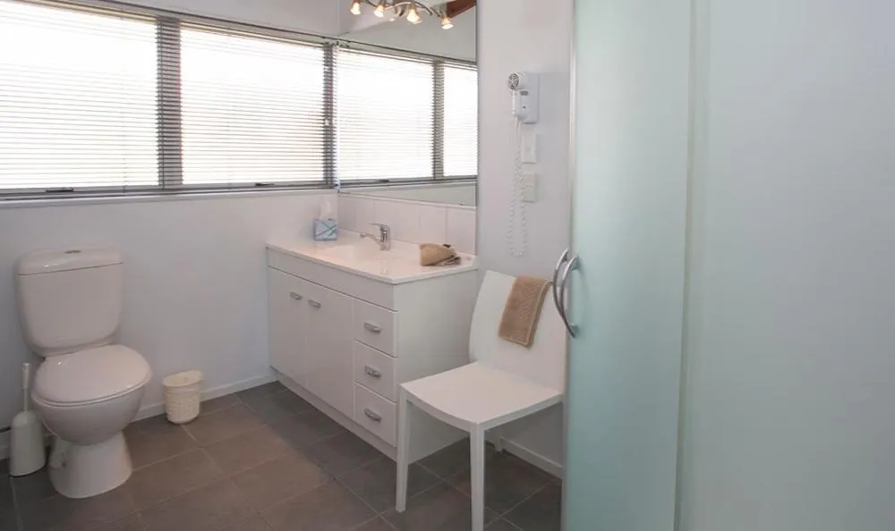 Toilet in Palm Pacific Resort & Motel