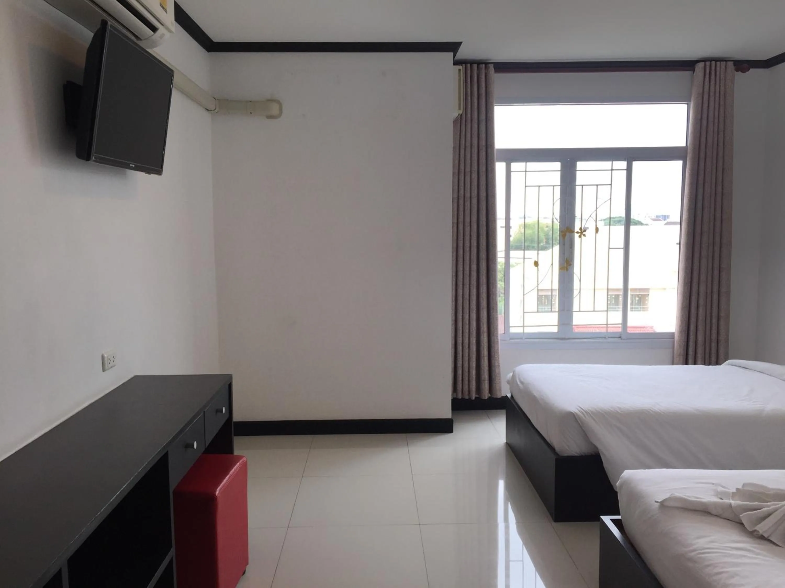 Bed in Leelawadee Grand Hotel