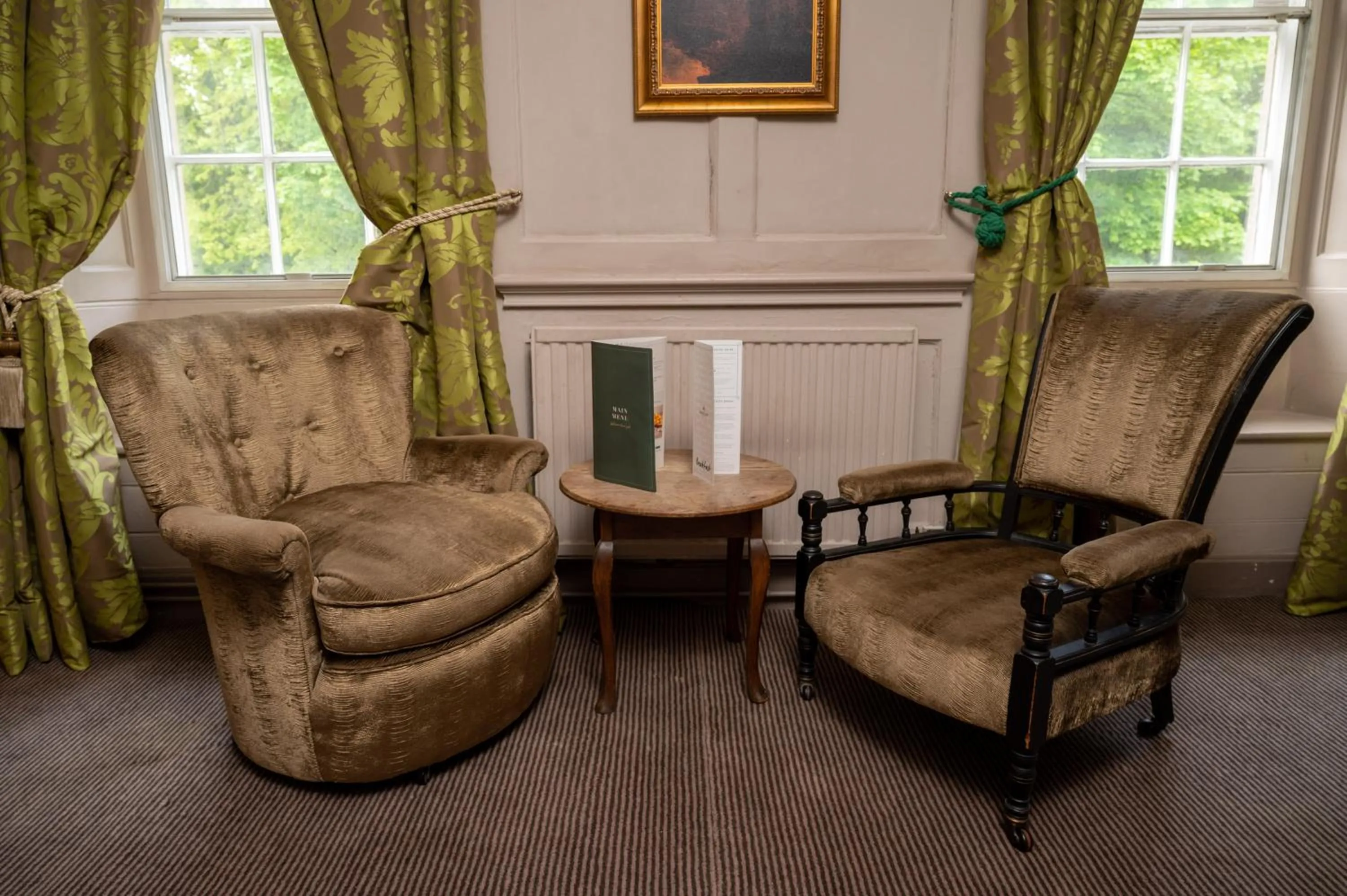Seating area in Cross Hands Hotel by Greene King Inns