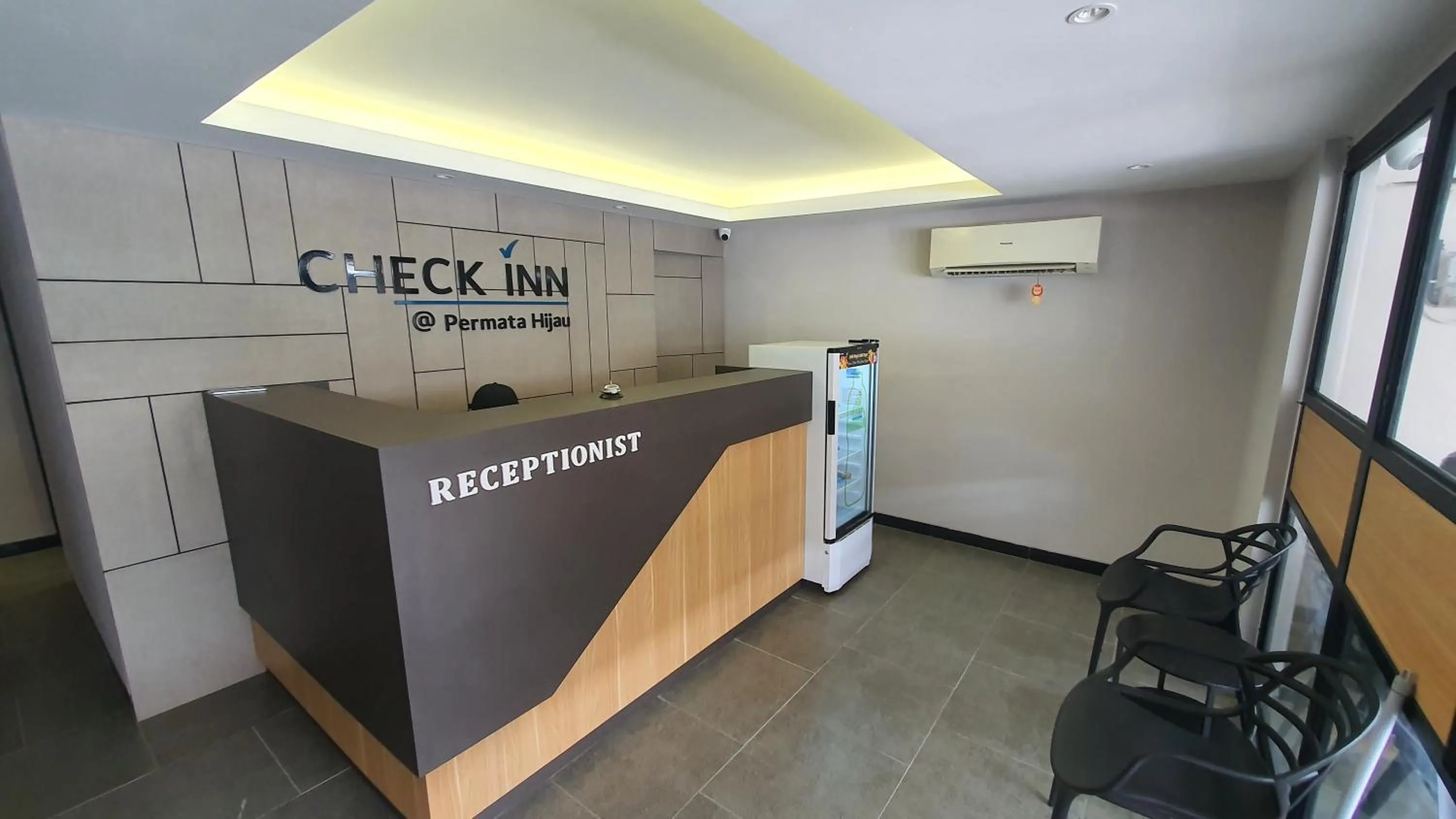Property logo or sign in Check Inn Permata Hijau