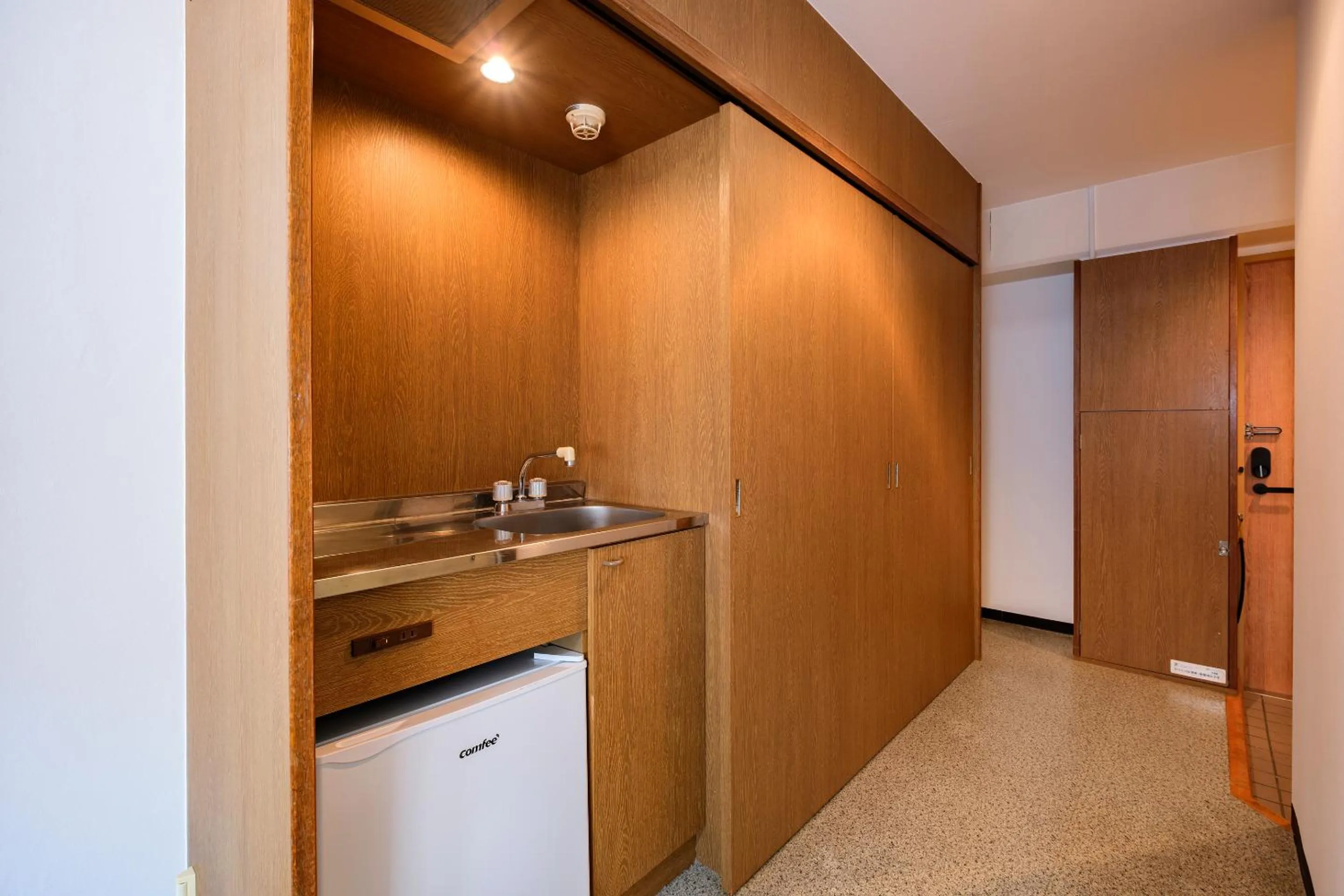 Kitchen or kitchenette in Miyazaki Mango Hotel