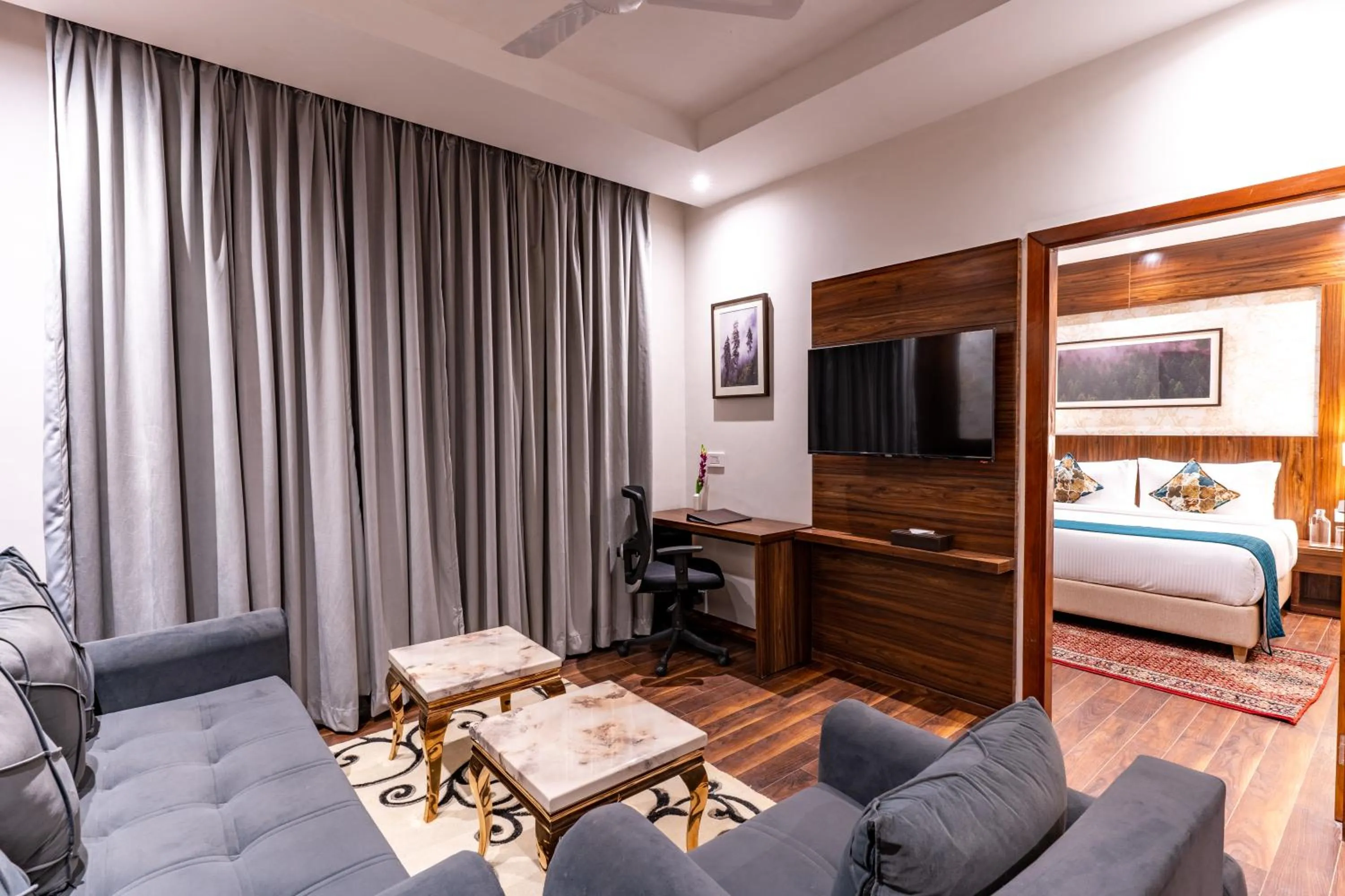 Living room, Bed in Regenta Place Panchkula Morni Hills