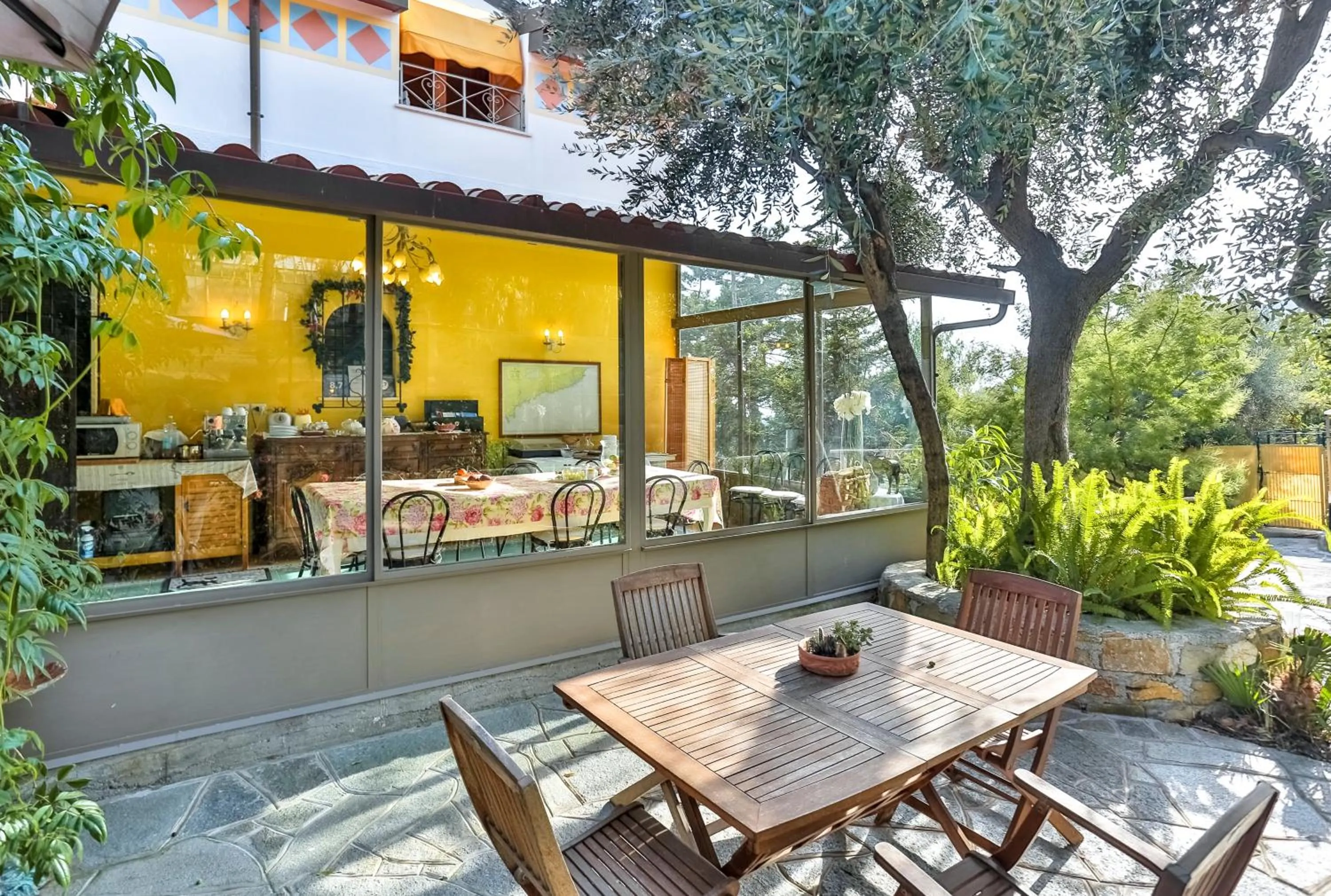 Communal lounge/ TV room in Cà De Rossana Bed&Breakfast