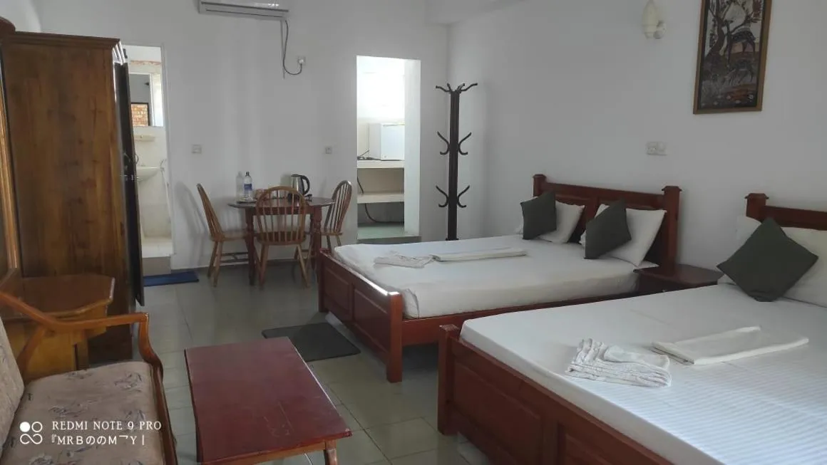 Photo of the whole room, Bed in Oasis Beach Resort