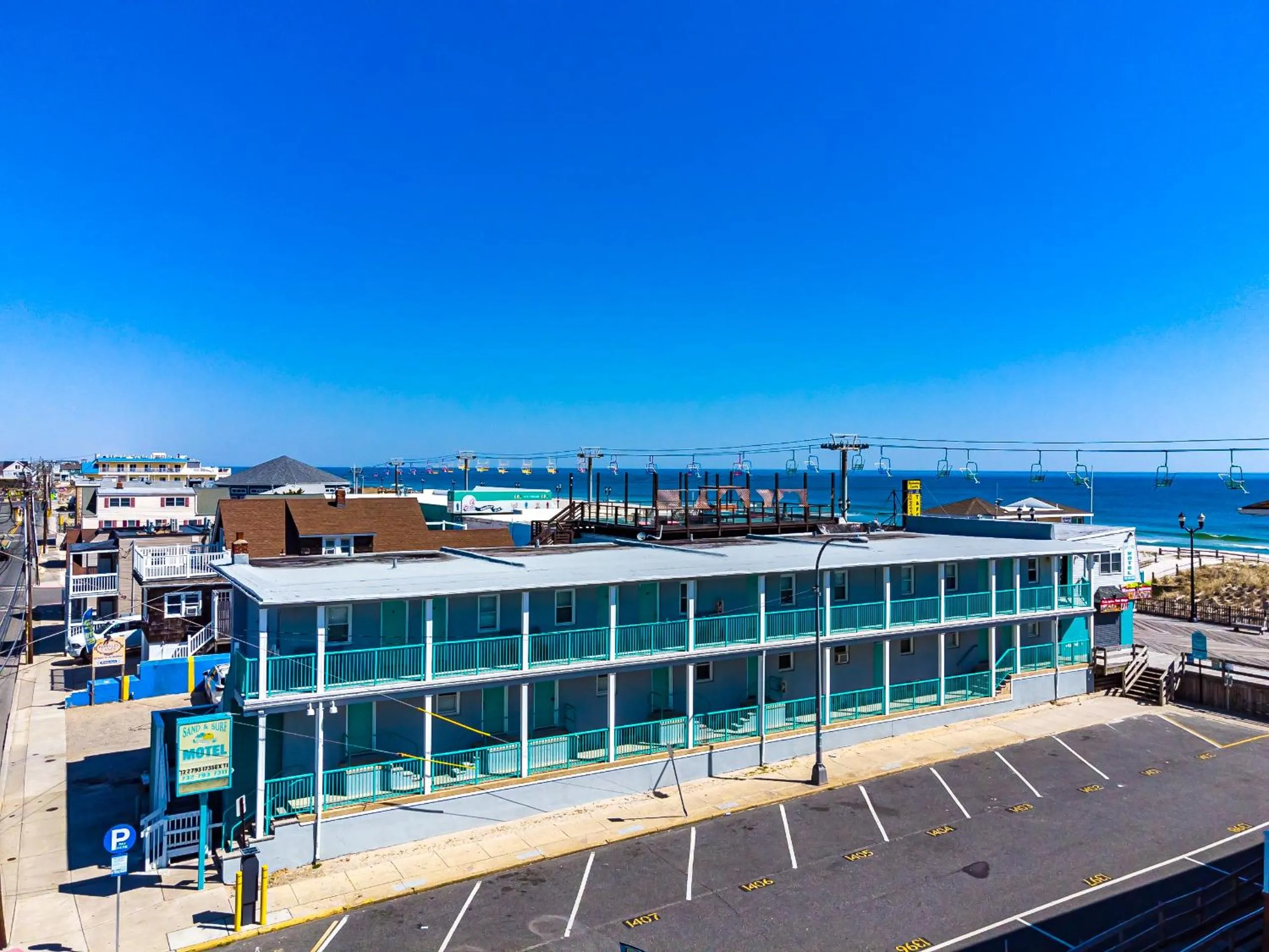 Property building in Boardwalk Sand & Surf Beach Hotel Oceanfront