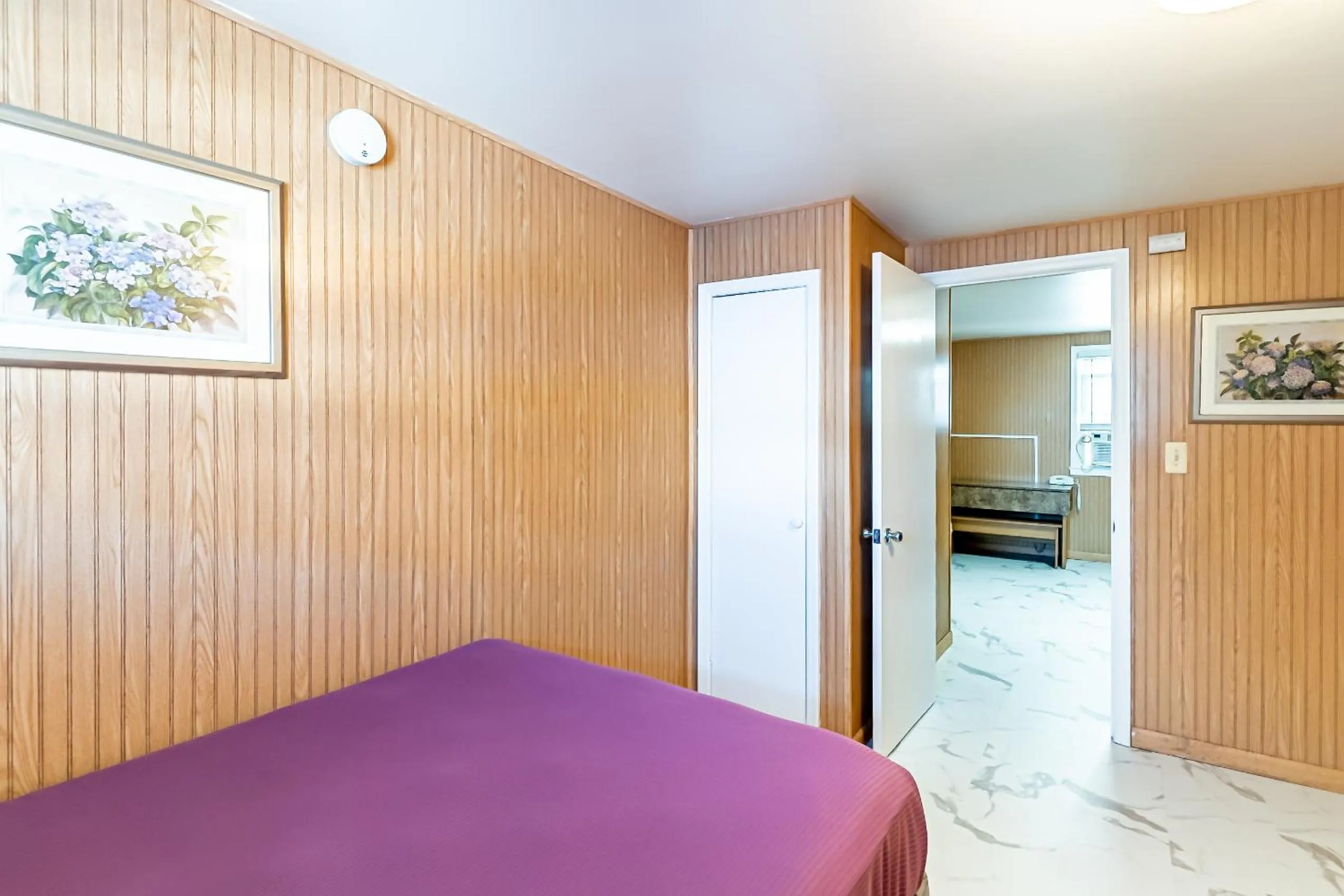 Bed in Boardwalk Sand & Surf Beach Hotel Oceanfront