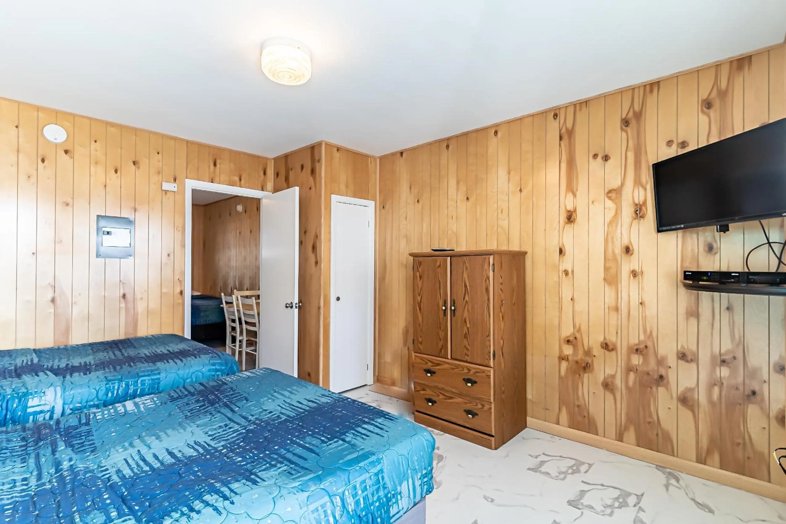 Bed in Boardwalk Sand & Surf Beach Hotel Oceanfront