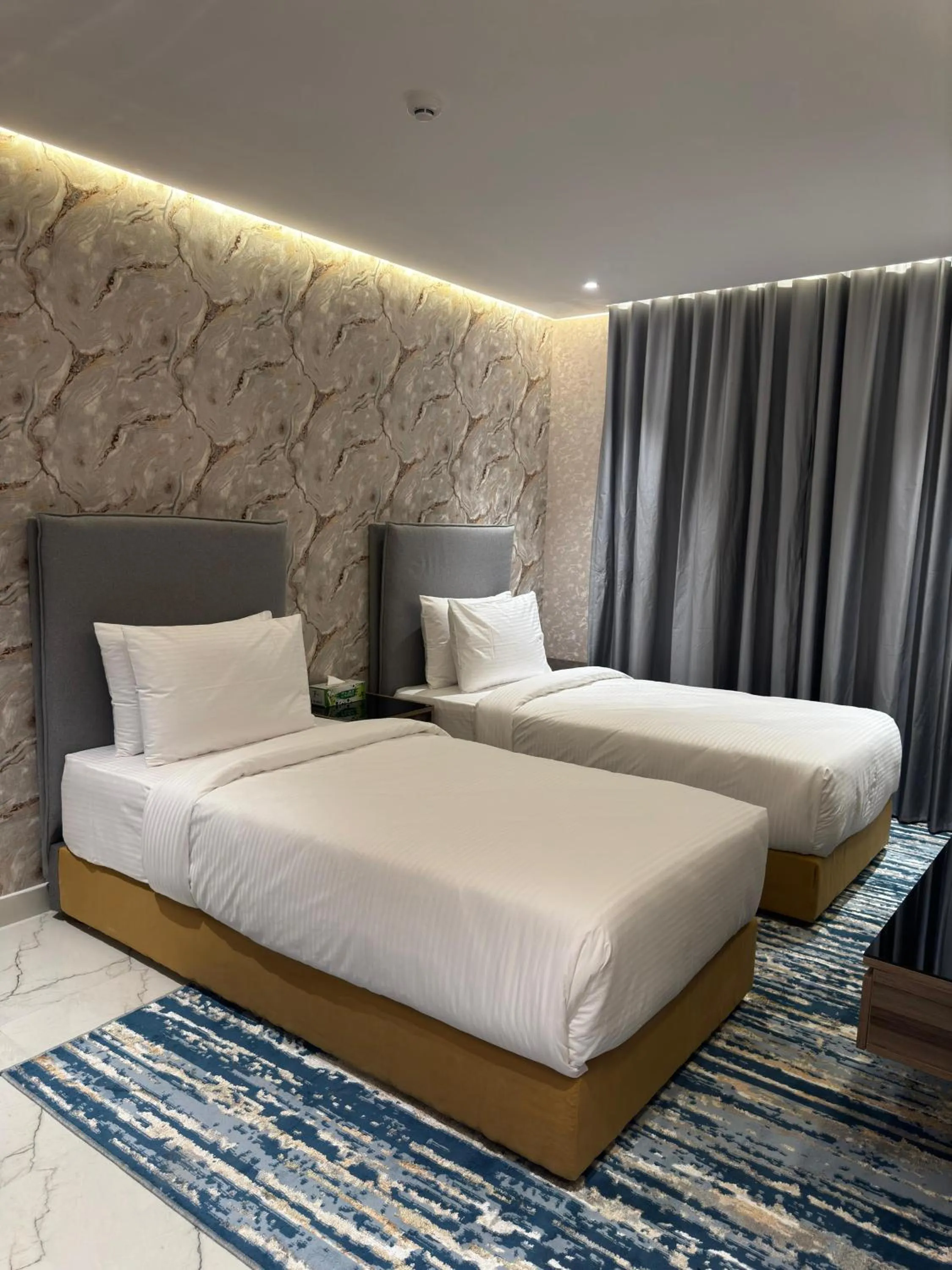 Bed in Royal Plaza Hotel