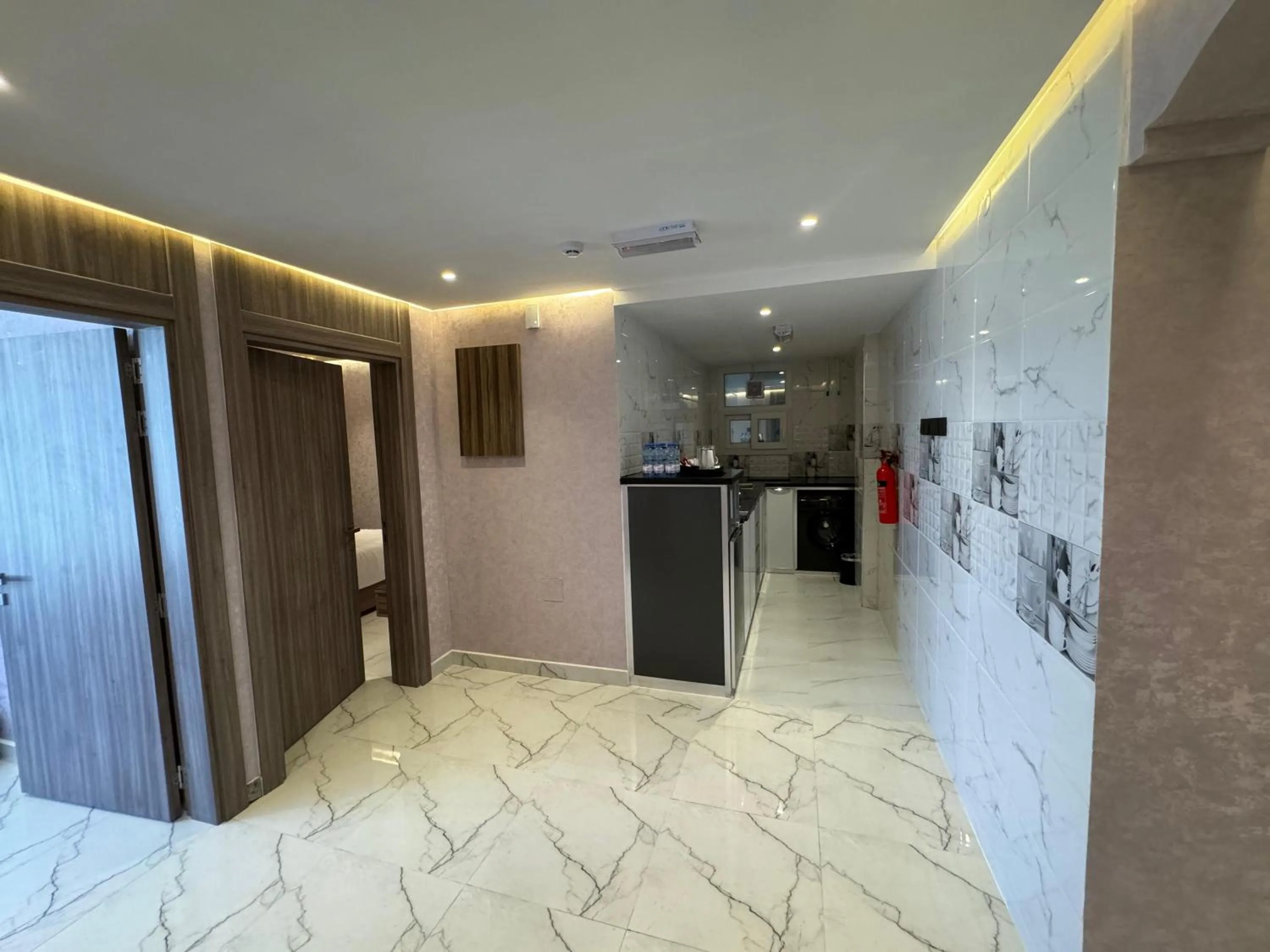 Kitchen or kitchenette in Royal Plaza Hotel