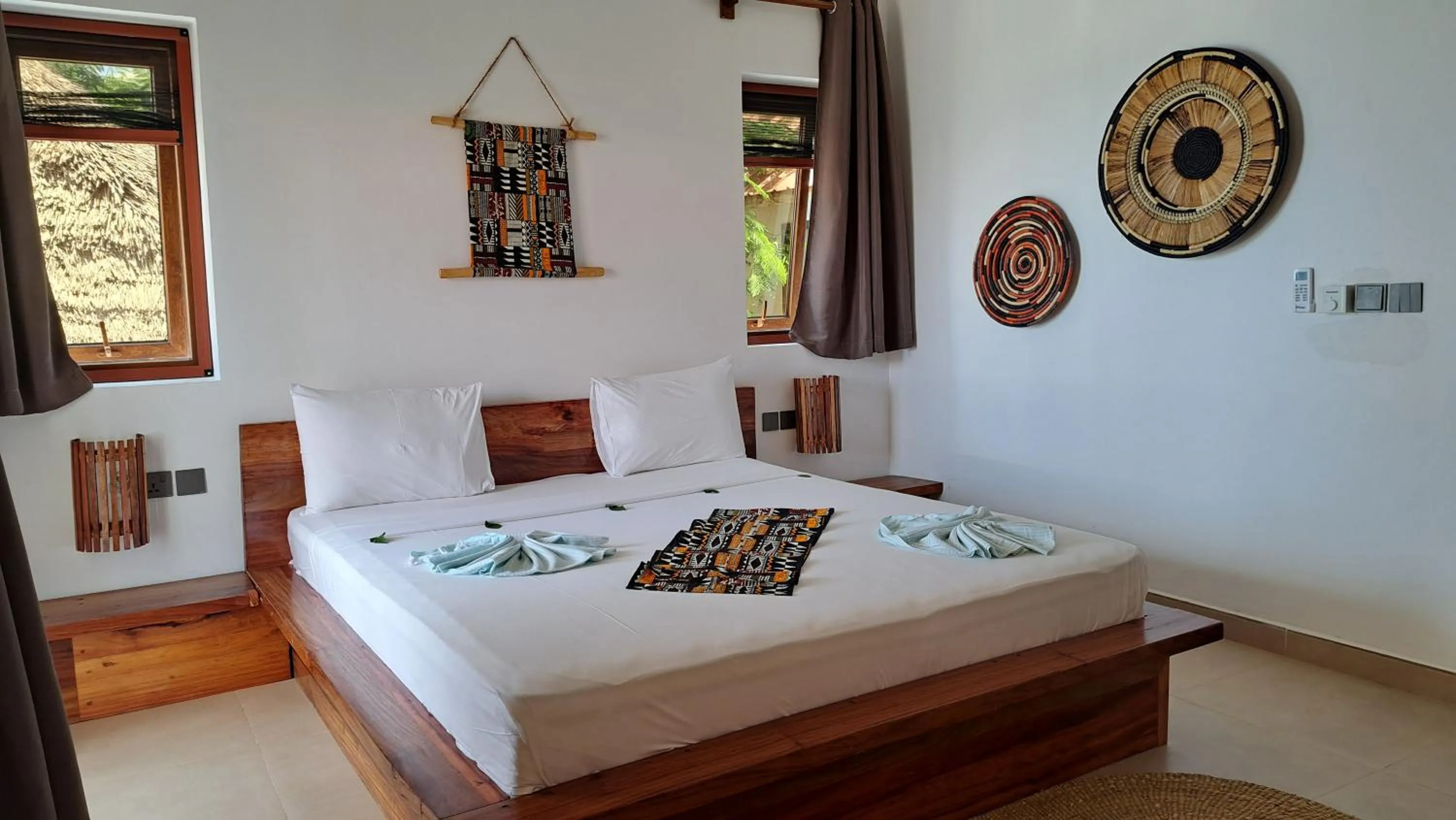 Bed in Aluna Beach Apartments