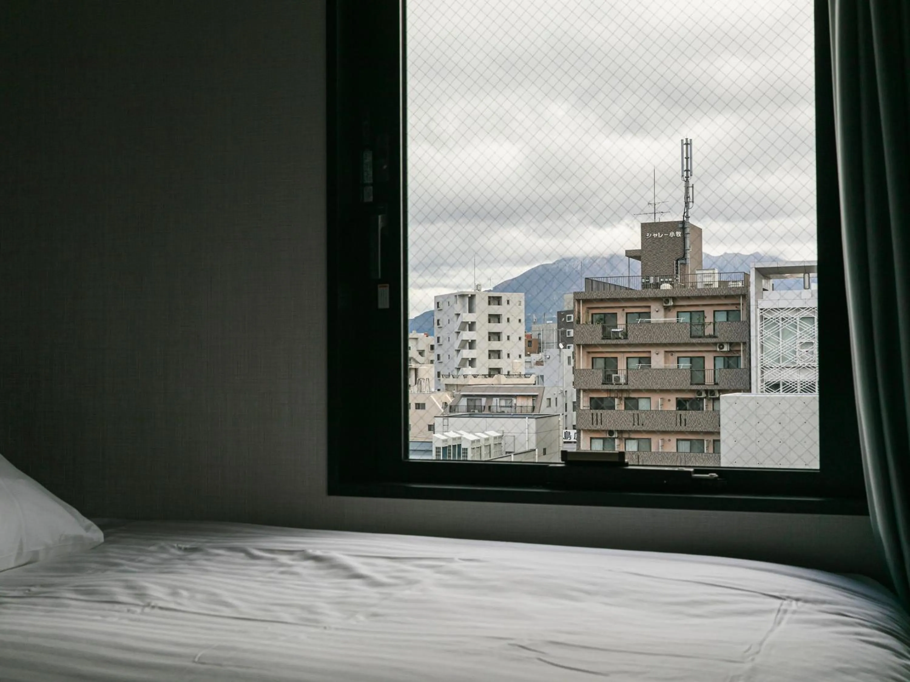 Photo of the whole room, Bed in HOTEL NOIR Kagoshima Chuo Station