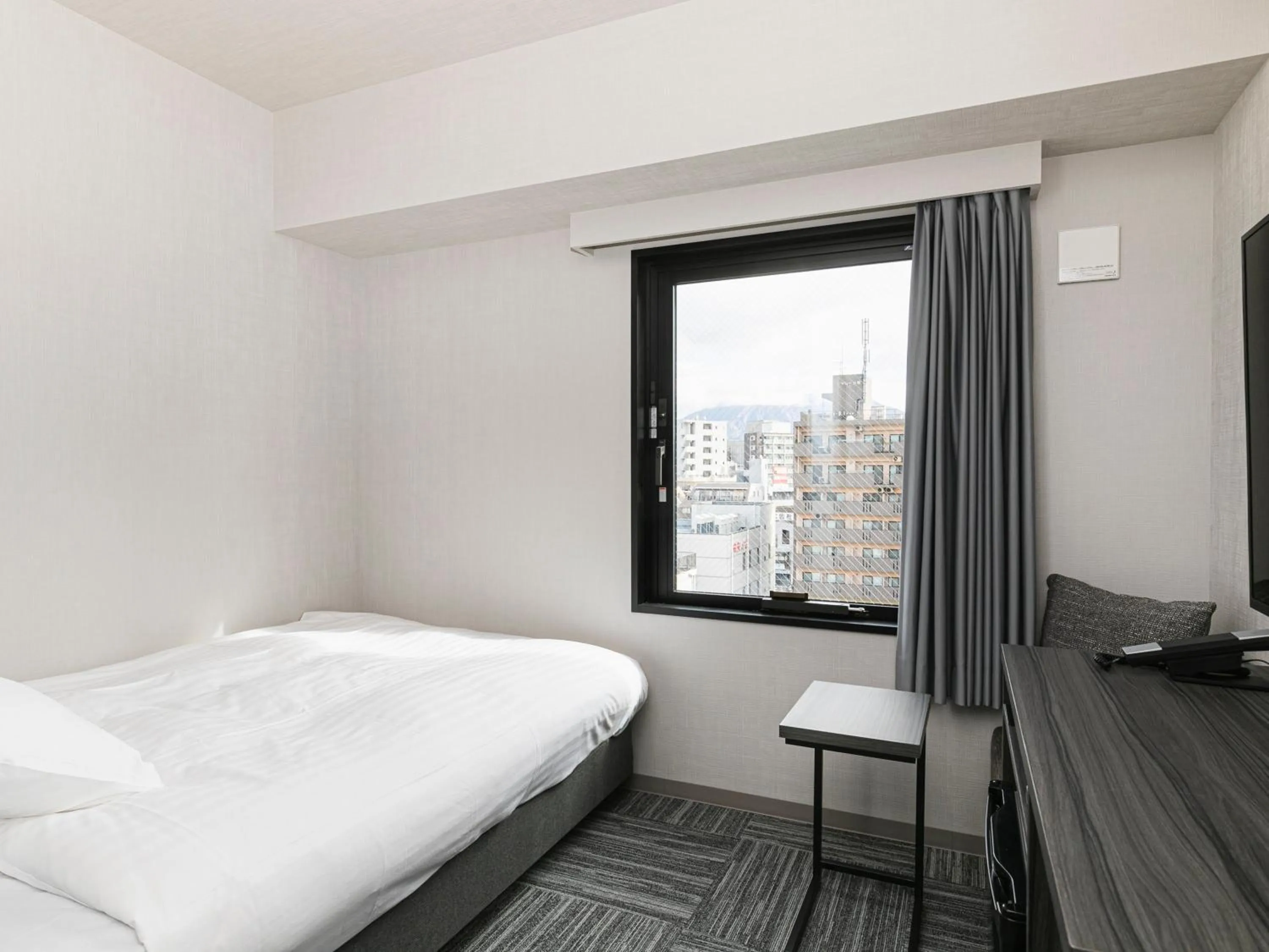 Photo of the whole room, Bed in HOTEL NOIR Kagoshima Chuo Station