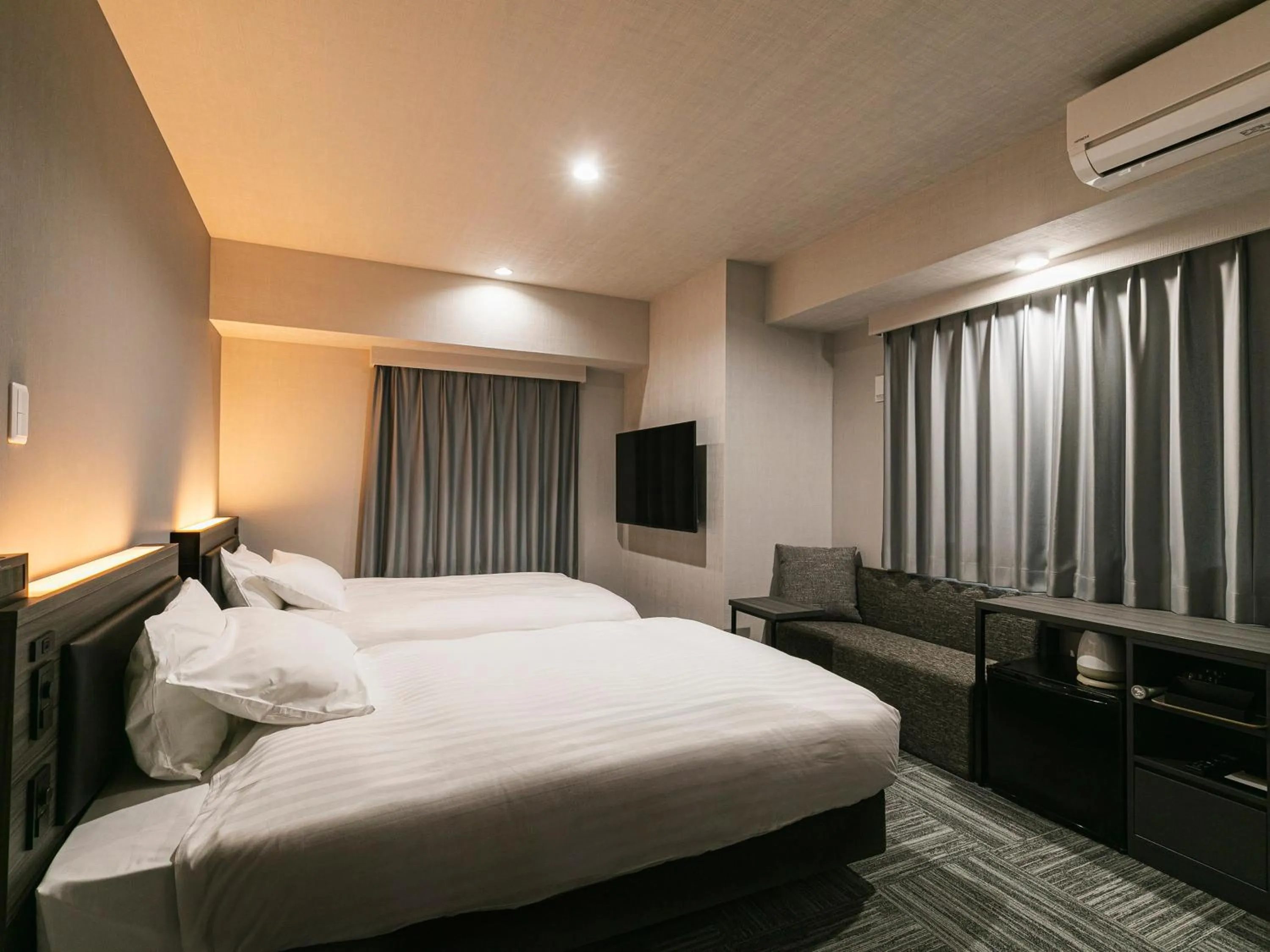 Bed in HOTEL NOIR Kagoshima Chuo Station