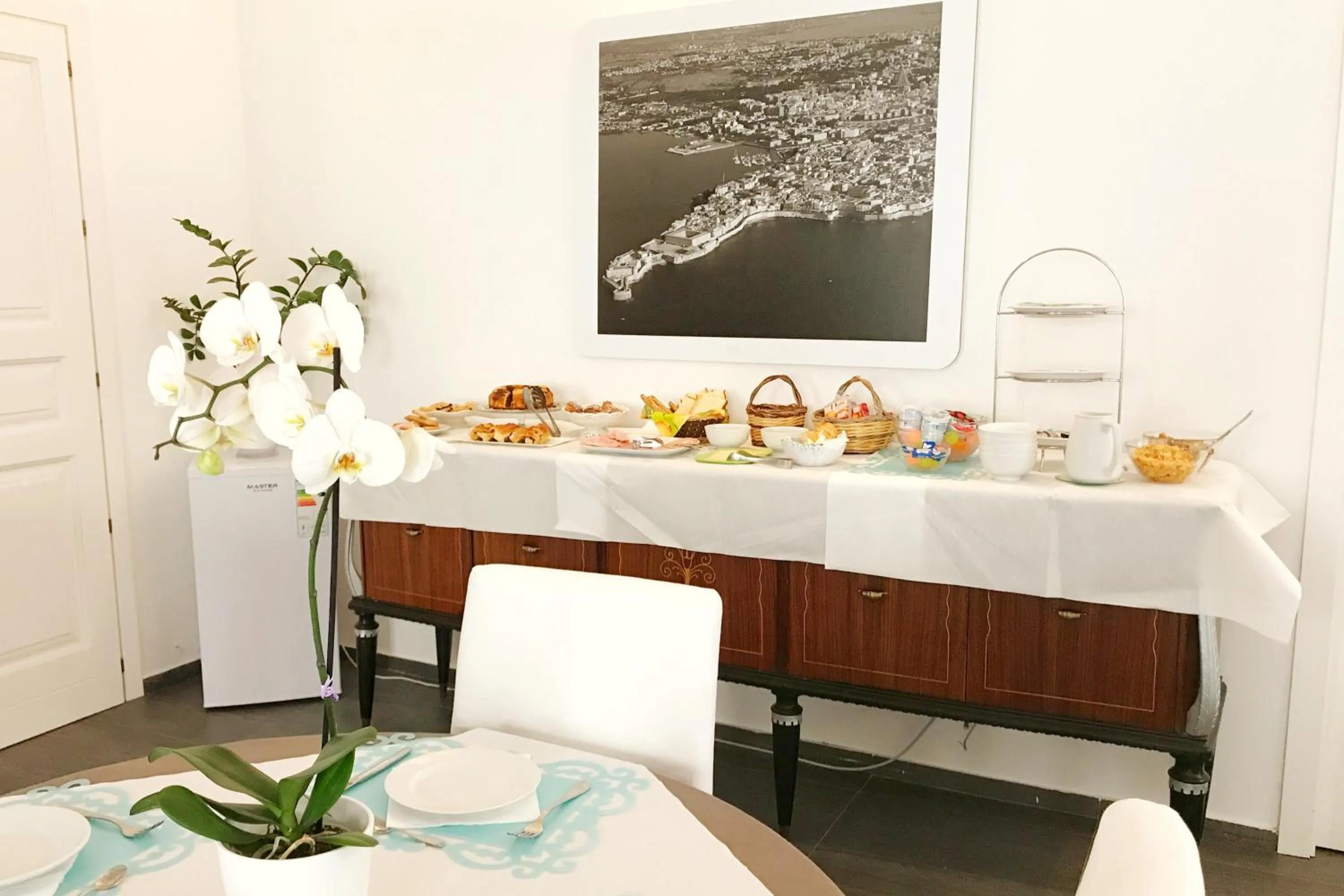 Communal lounge/ TV room in La Residenza del Reginale