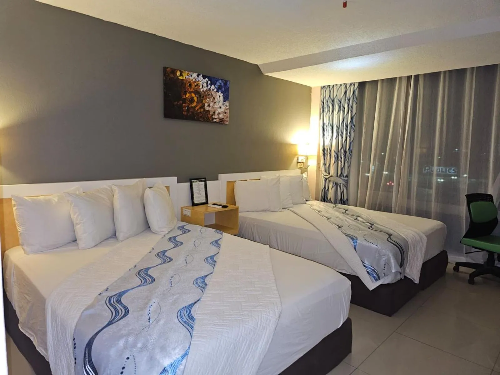 Bed in Golden Tree Hotel Belize