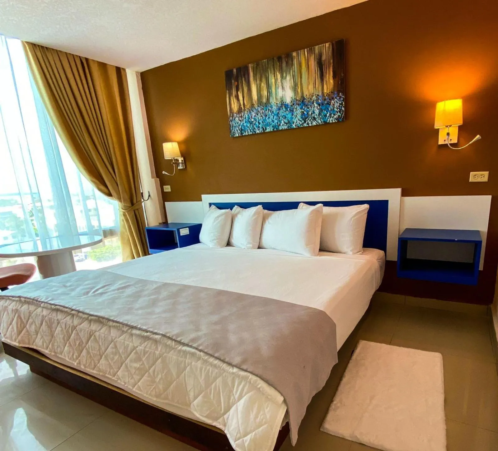 Bed in Golden Tree Hotel Belize