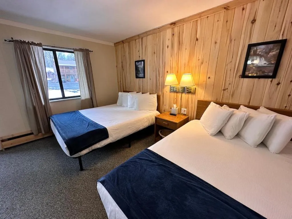 Bed in Ute Bluff Lodge, Cabins and RV park