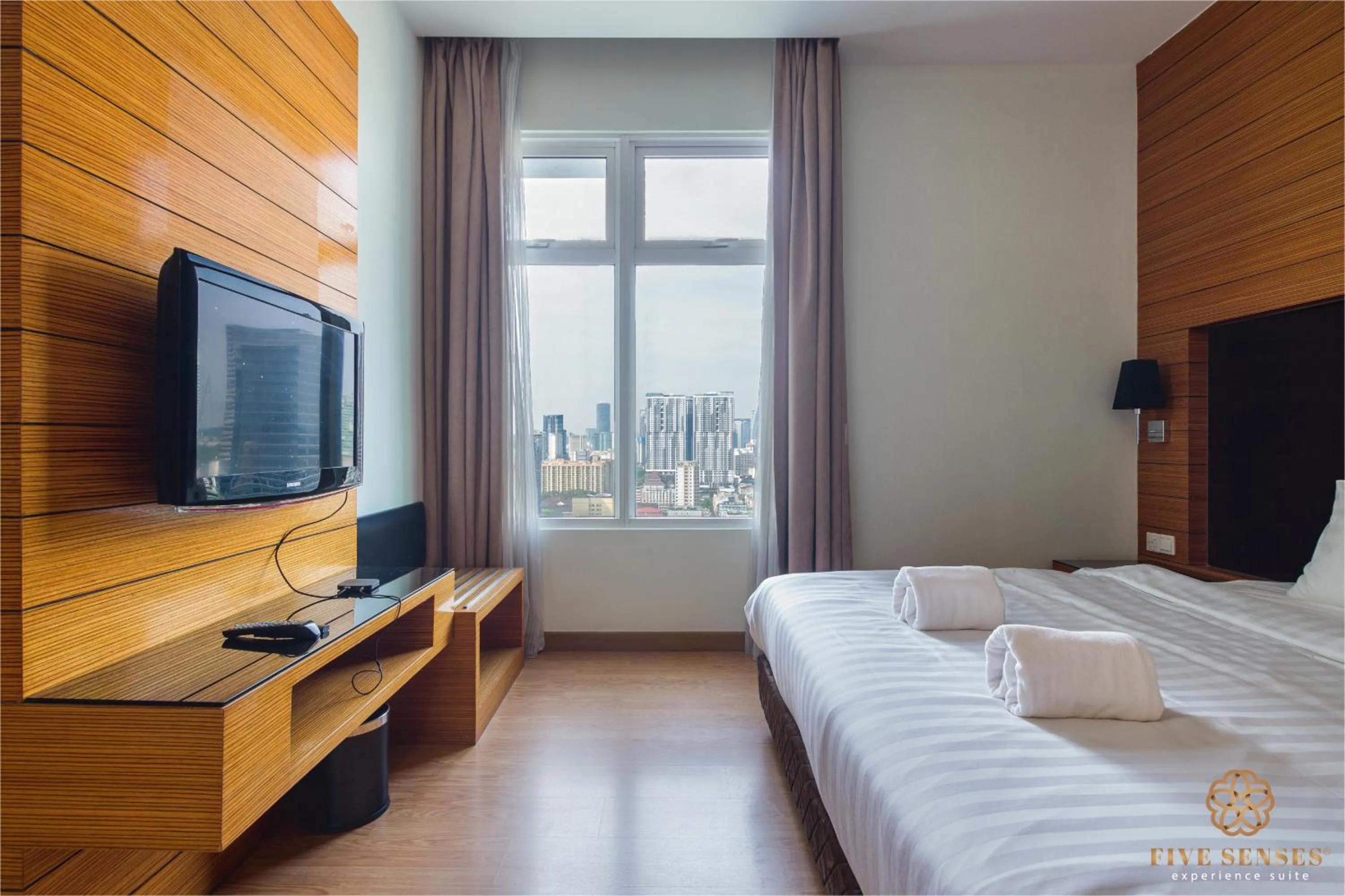 Bed in Dua Sentral Signature Suites