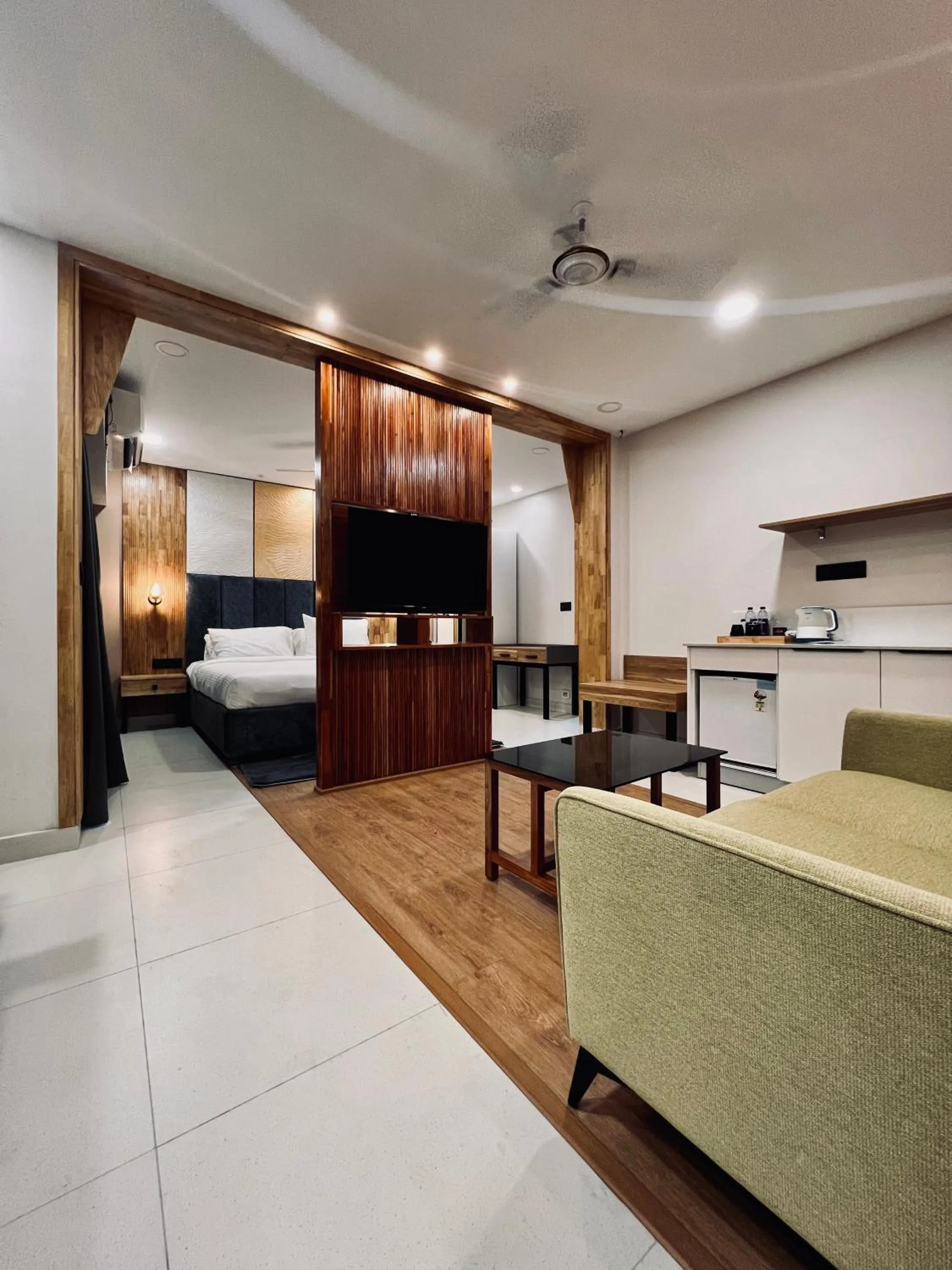 Living room, Bed in The Habitat Suites-Walkable distance to Guruvayoor temple