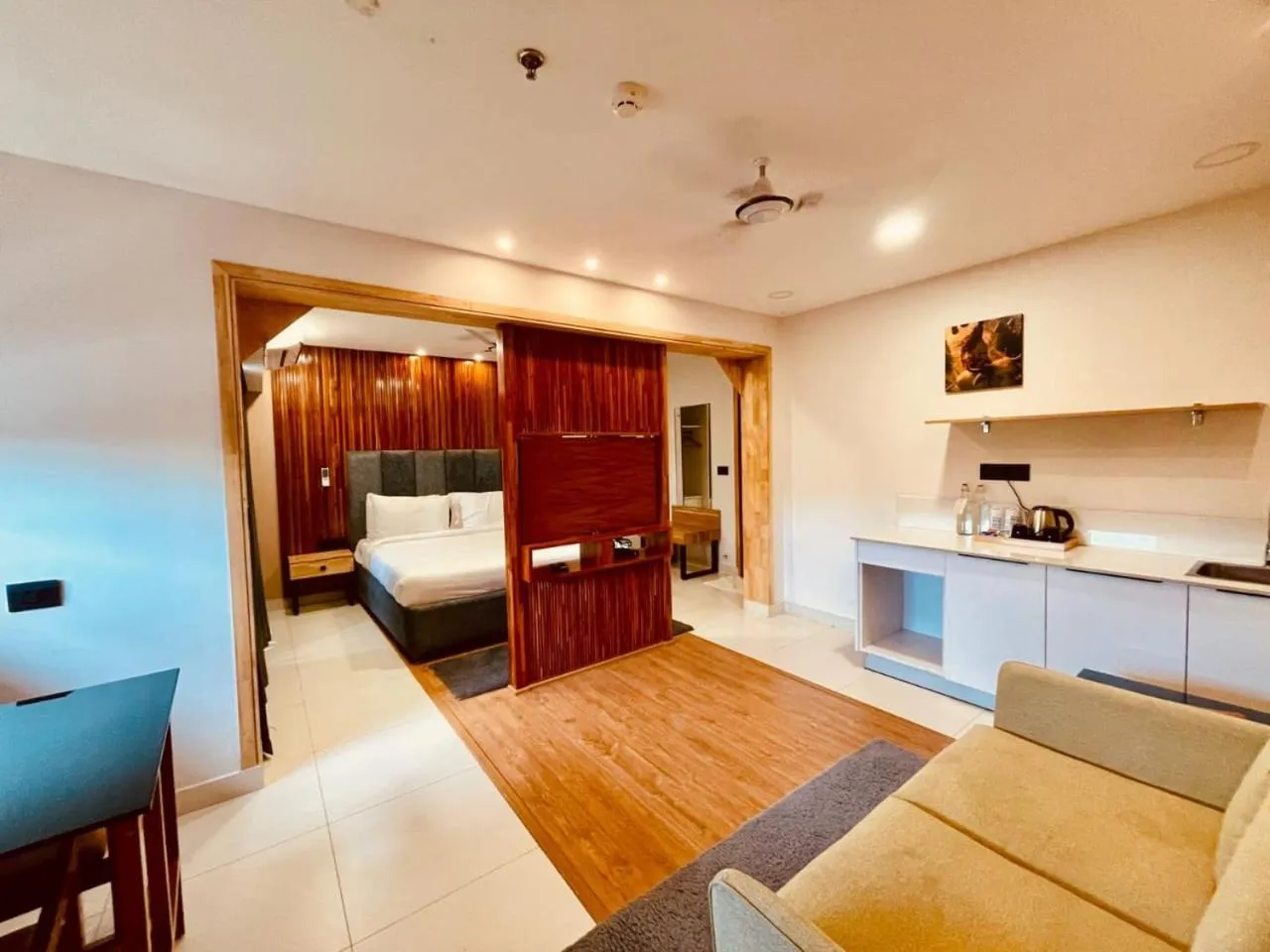 TV and multimedia, Bed in The Habitat Suites-Walkable distance to Guruvayoor temple