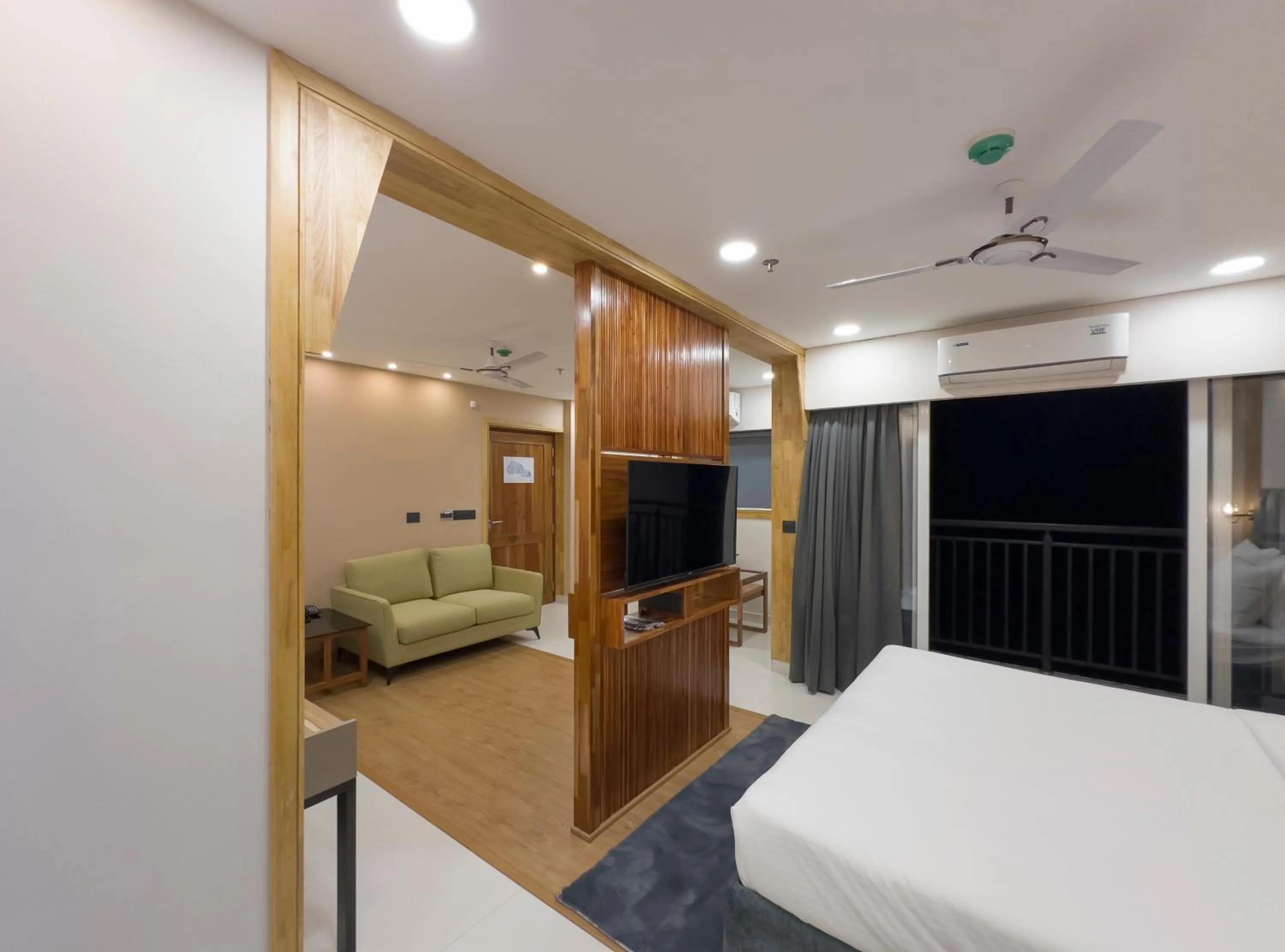 TV and multimedia, Bed in The Habitat Suites-Walkable distance to Guruvayoor temple