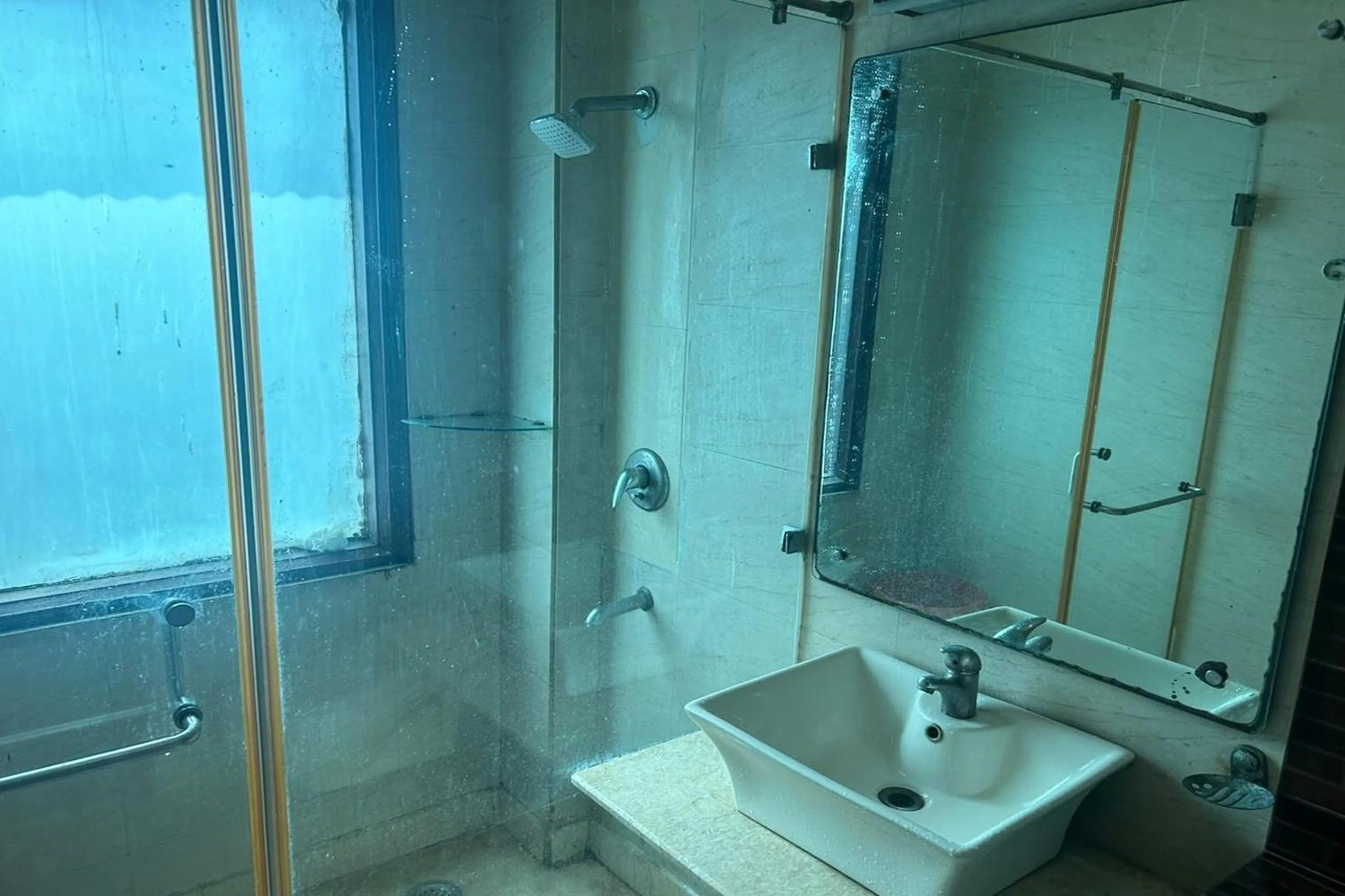 Bathroom in The Metropolis Guest House Near RK Ashram Metro Station