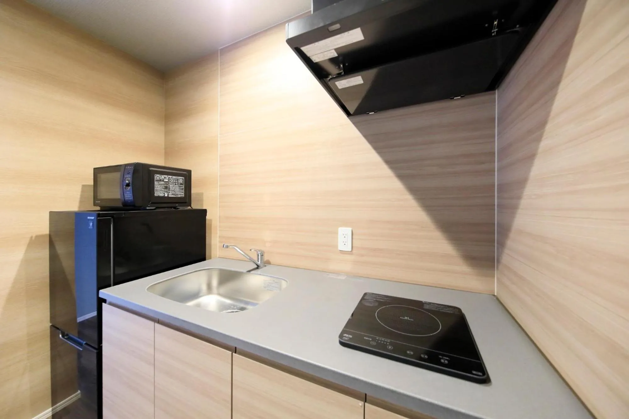 Kitchen or kitchenette in VIVOVIVA石垣島