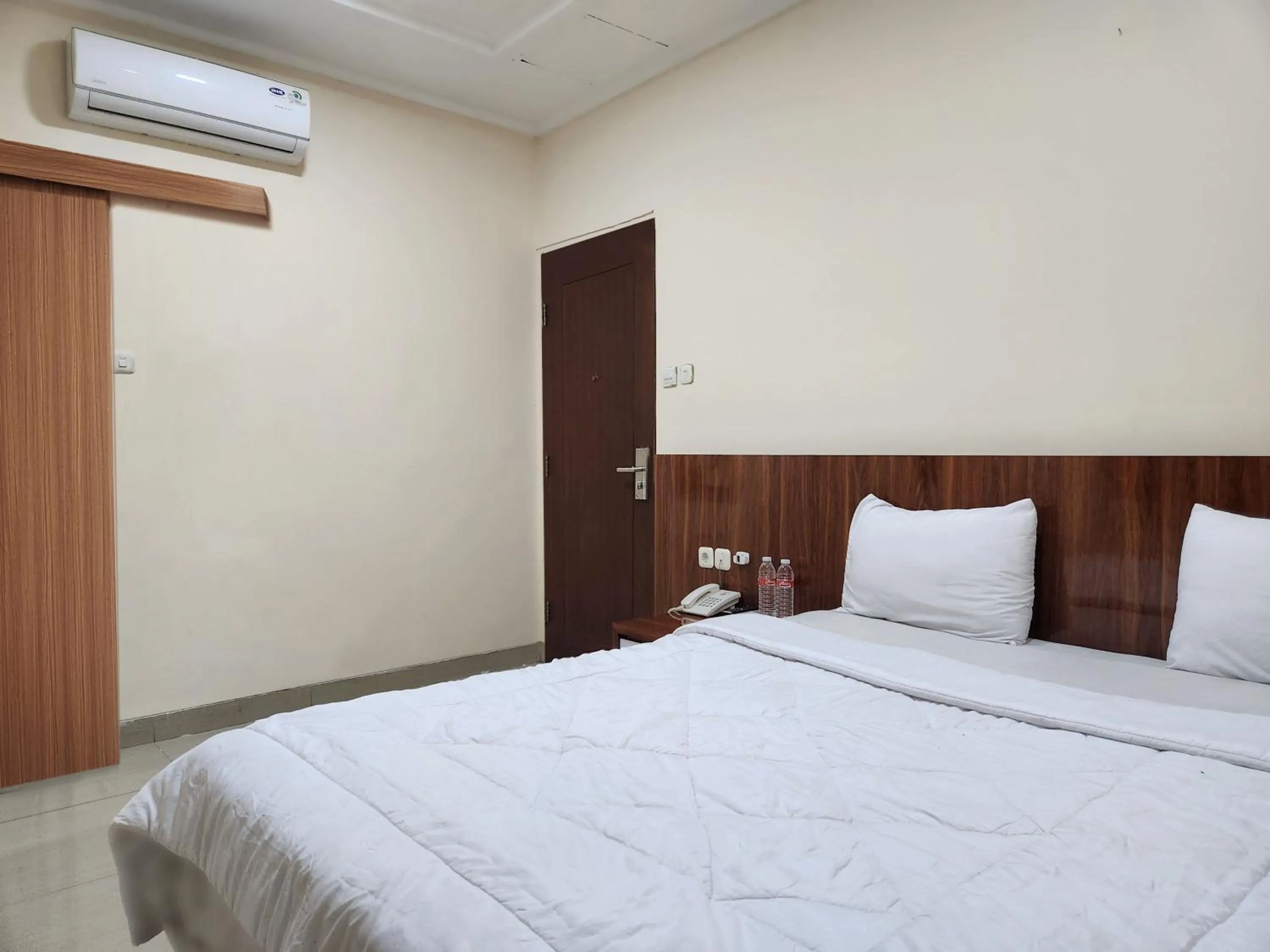 Bed in Joker Hotel & Residence
