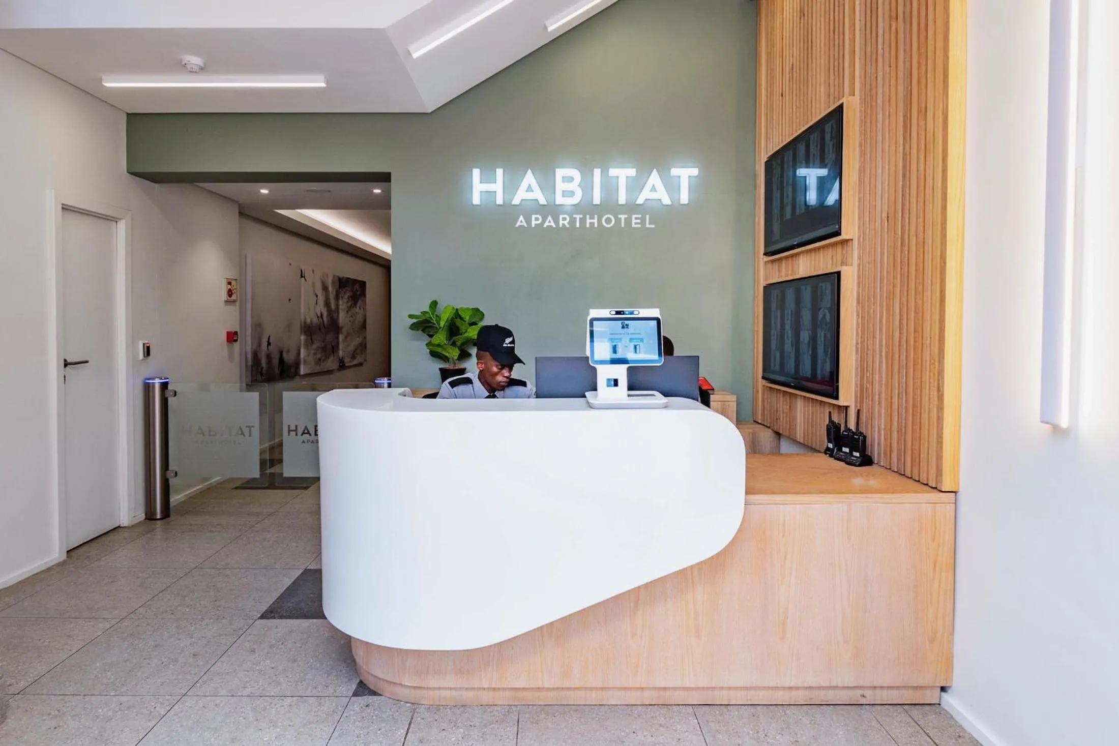 Lobby or reception in Habitat Aparthotel by Totalstay