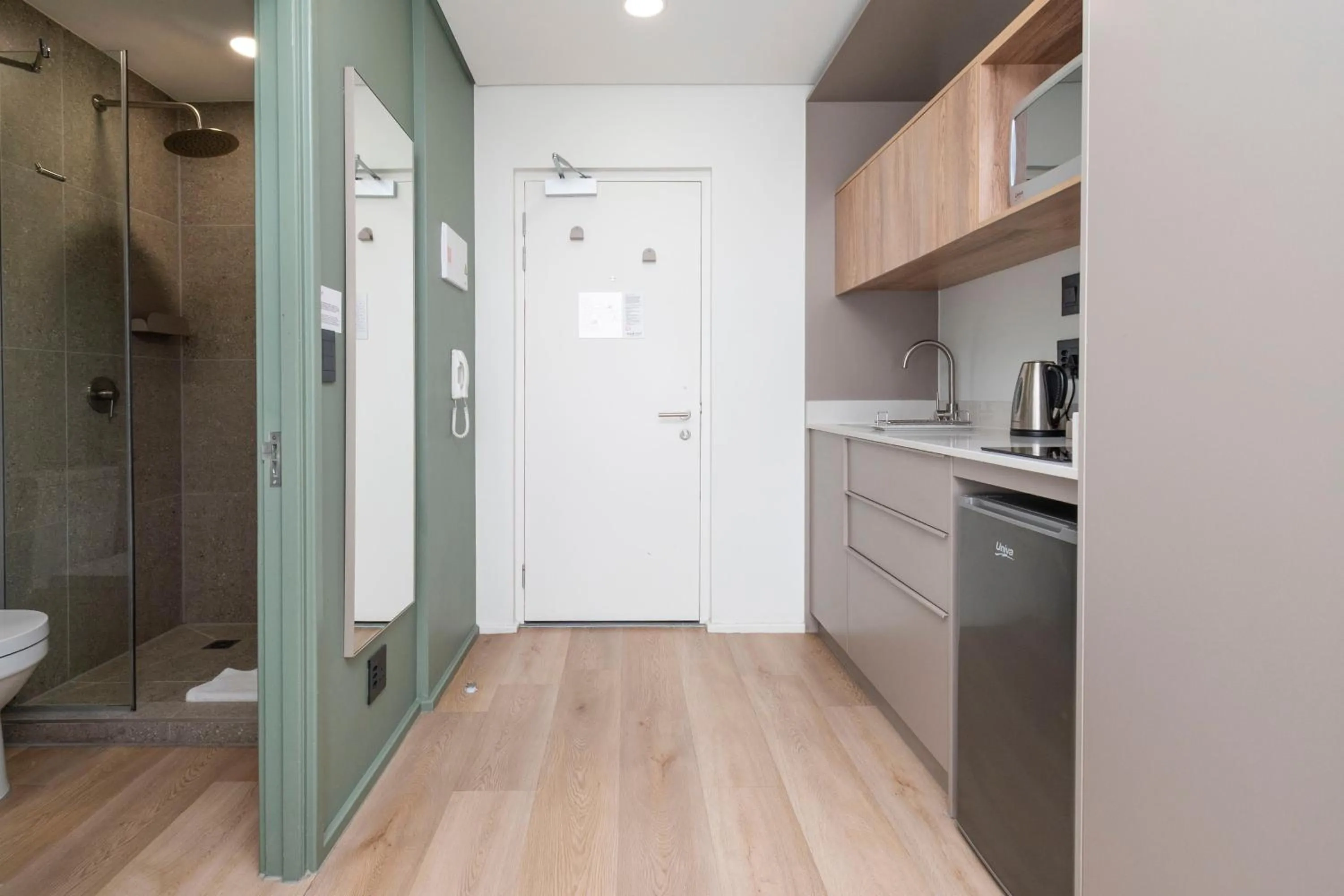 Kitchen or kitchenette in Habitat Aparthotel by Totalstay