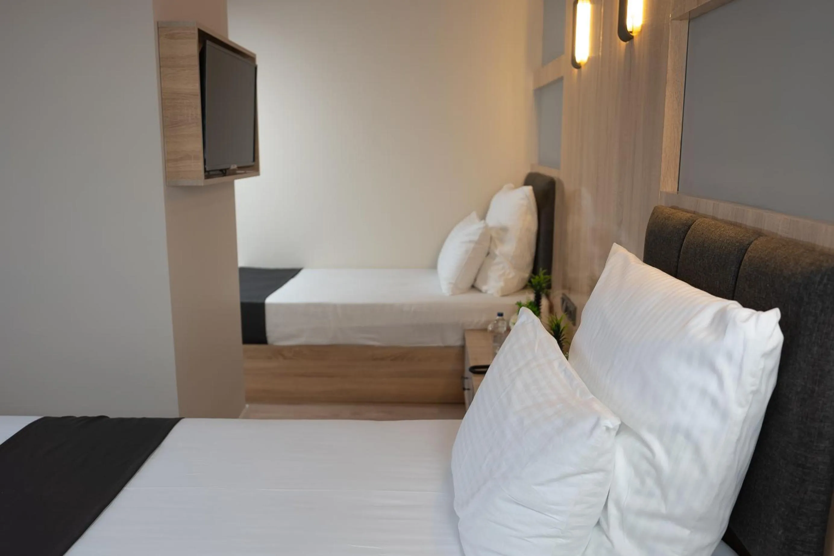 Bed in Golden River Hotel By Continent