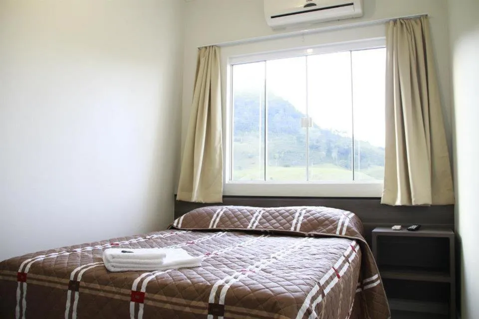 Bed in Hotel Bergozza