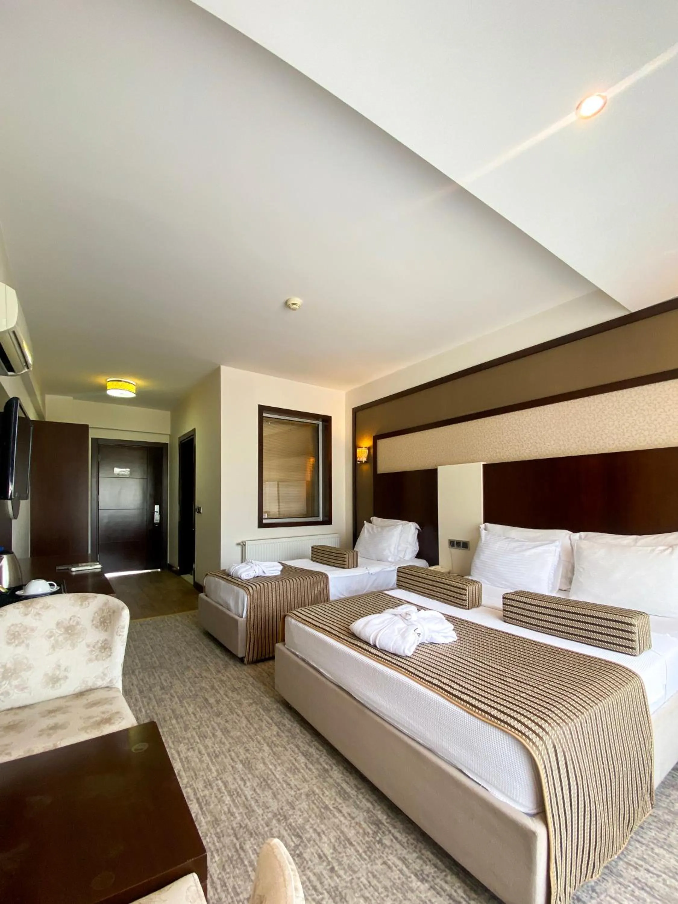 Bed in Lavin Hotel & Spa